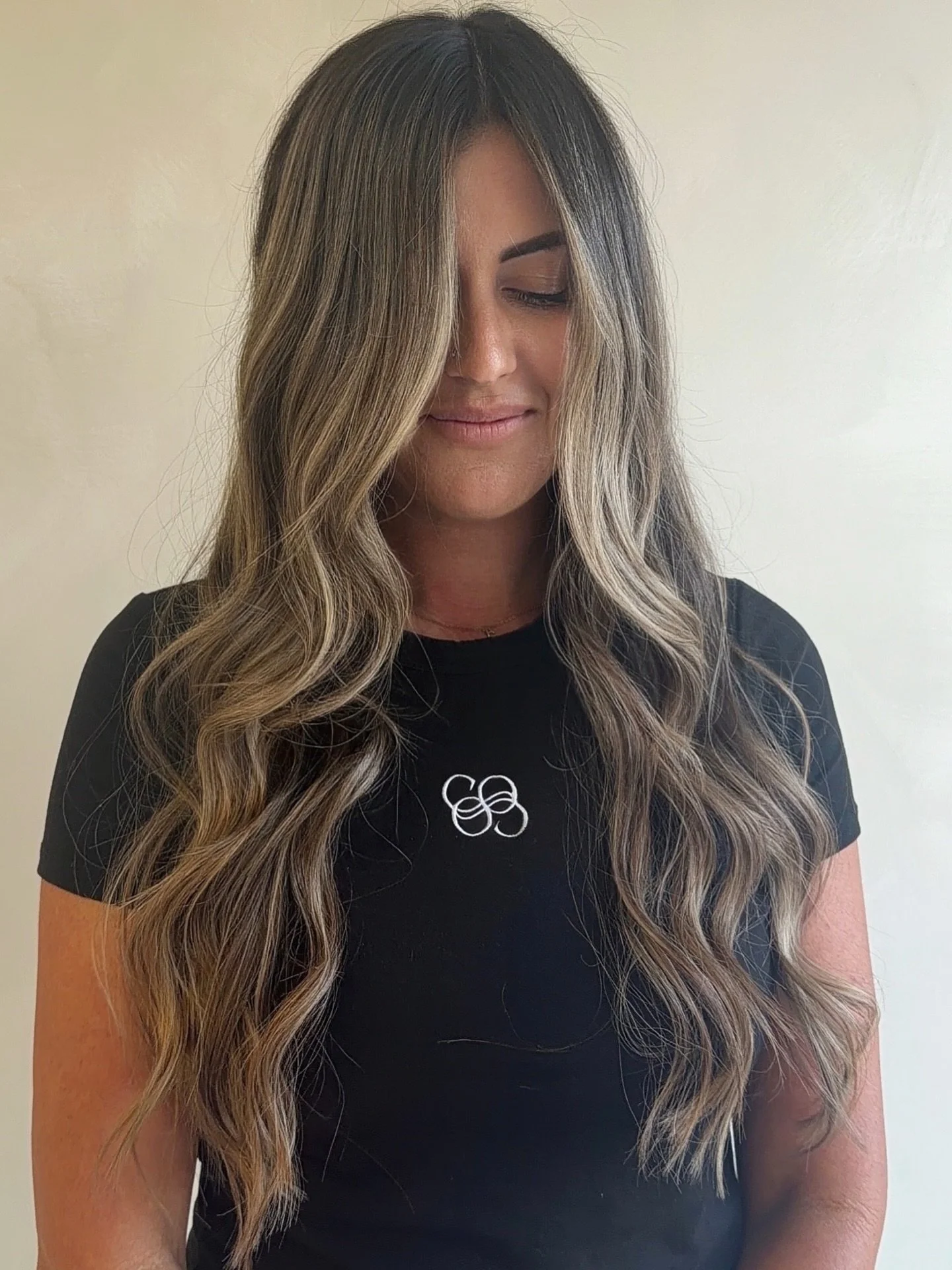 Thinking of retiring the blonde but not ready to step away completely?
This is your answer. 🤎

We took grown-out heavy bleach and transformed it into rich, multidimensional brunette with just enough lightness woven through to keep that brightness yo
