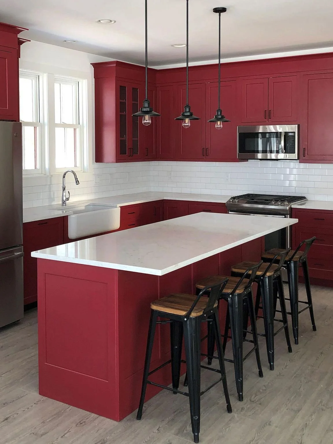 White and deep red kitchen with black accents