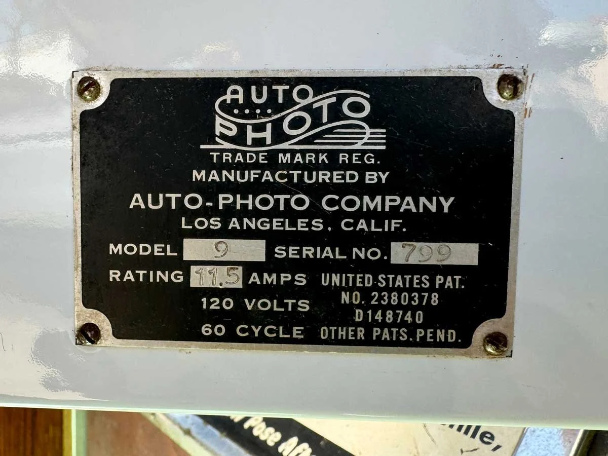 Auto Photo Photobooth Model 9 Serial Plate is Black with Silver and offers voltage amps and serial number 799