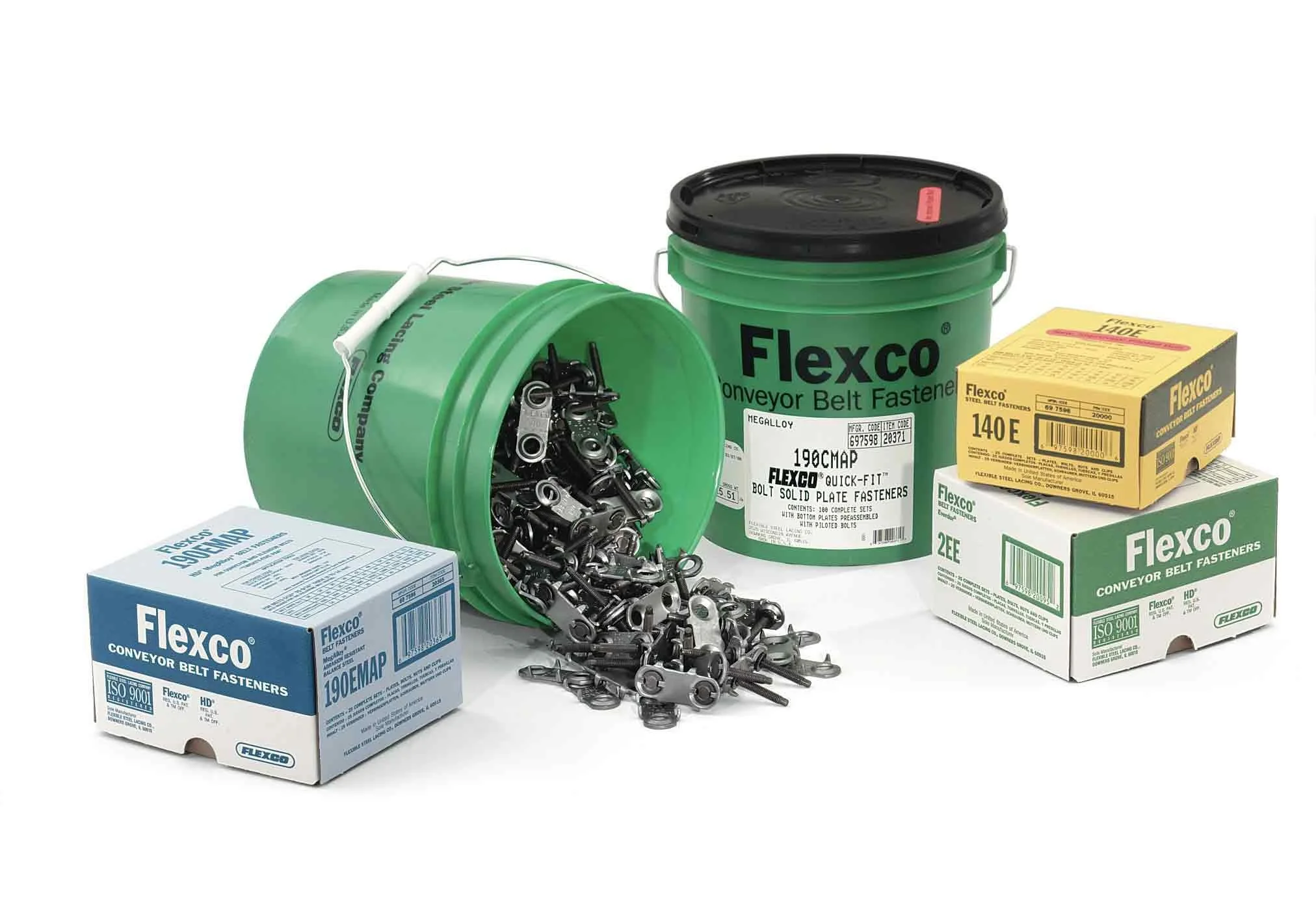 Flexco conveyor belt fasteners in boxes and buckets, with some fasteners spilling out.