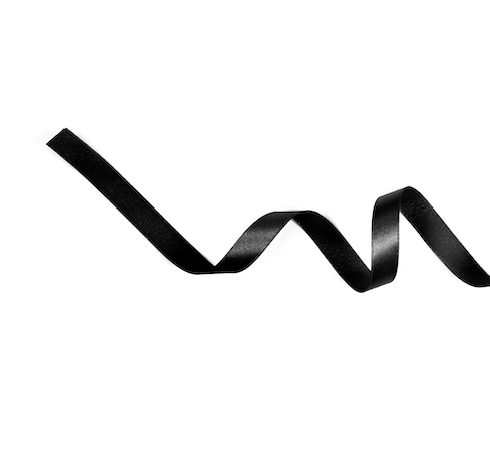 Curved black ribbon isolated on white background