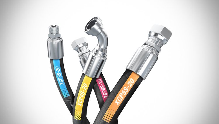 Three hydraulic or fuel hoses with colored labels and metal fittings, labeled KCP55-20, KCP45-20, and XCP55-20.