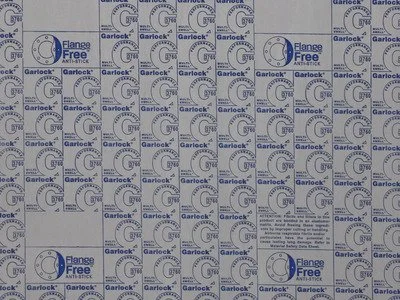 A sheet of Garlok brand flange-free gasket material with multiple copies of the product label printed on it.