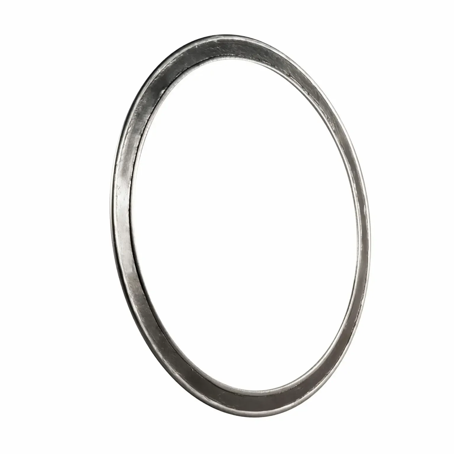 A silver metal washer against a white background.