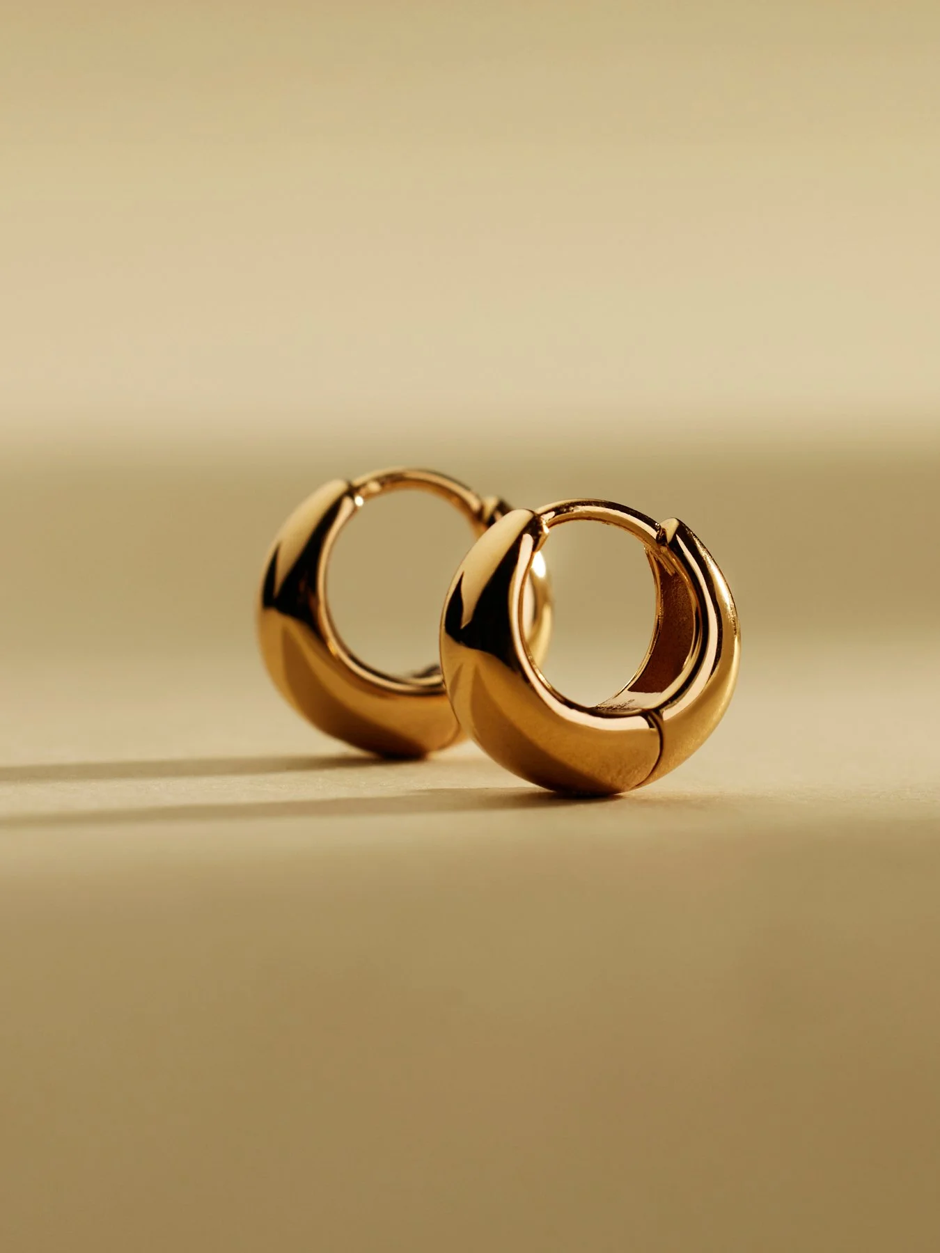 Gloss Essentials_Gloss Huggie Hoops_Flatlay.jpg