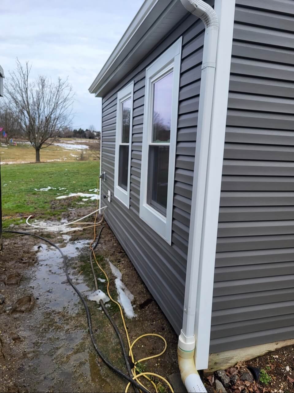 View of corner and siding seamlessly flowing around the house. Project by DLR in northeast ohio.