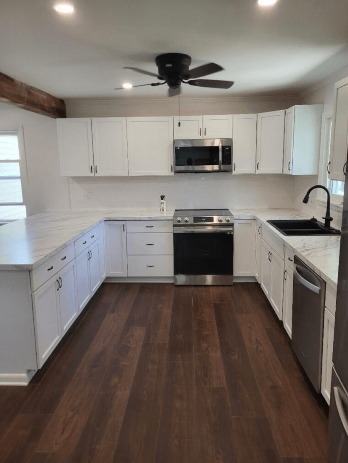 Modern kitchen cabinets and flooring installation in Tallmadge home