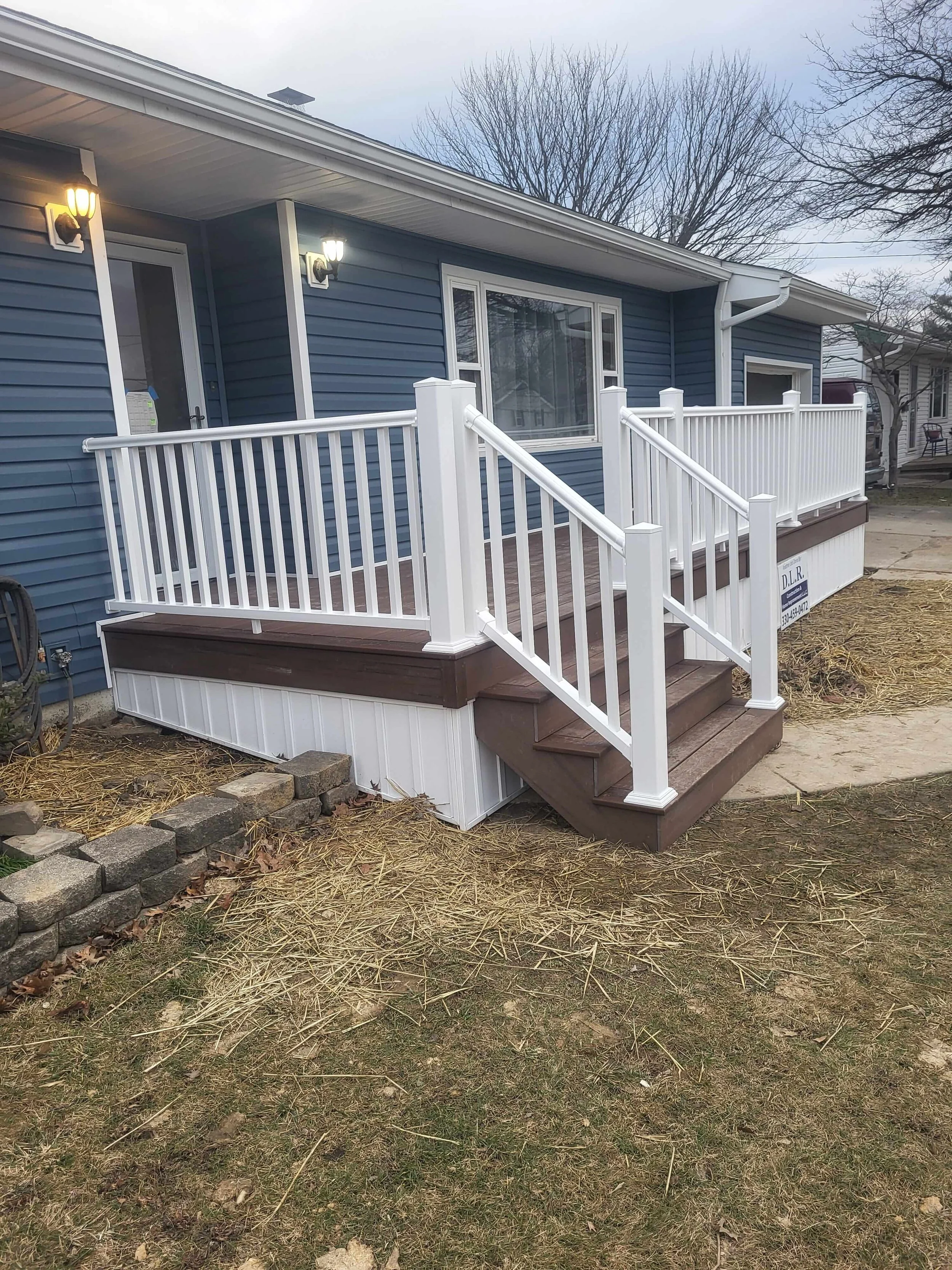 White Vinyl Railing Installation on Front Deck