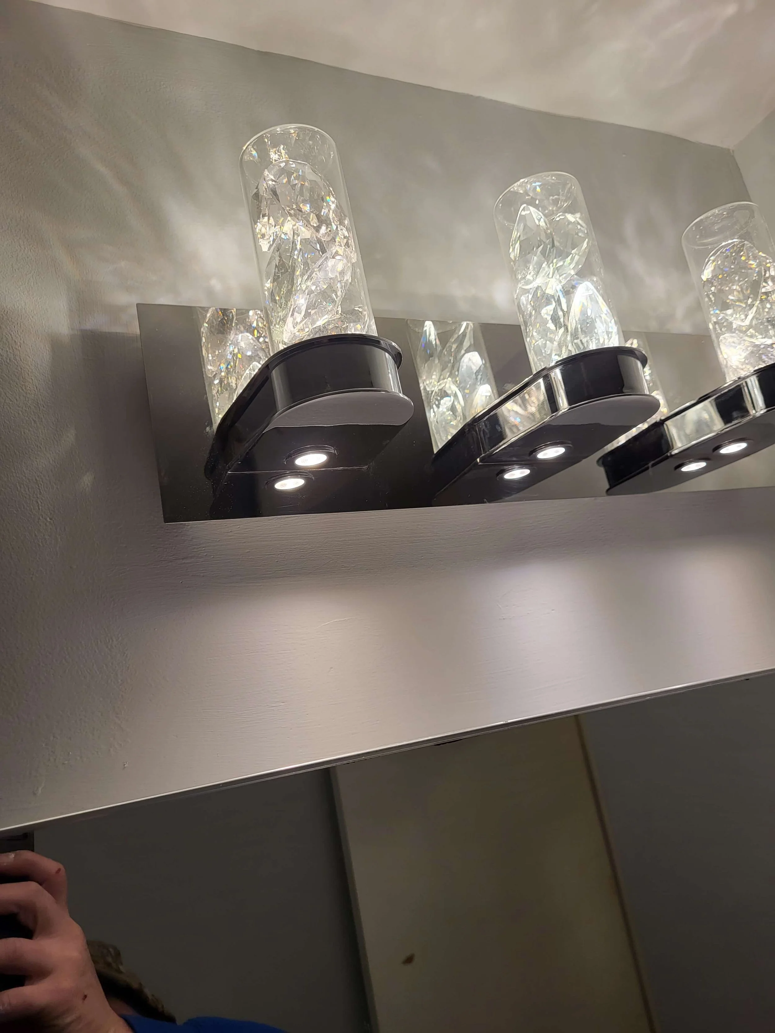 Modern Bathroom Light Bar, Globe Fixtures, Mirrors, and Wall Finishing