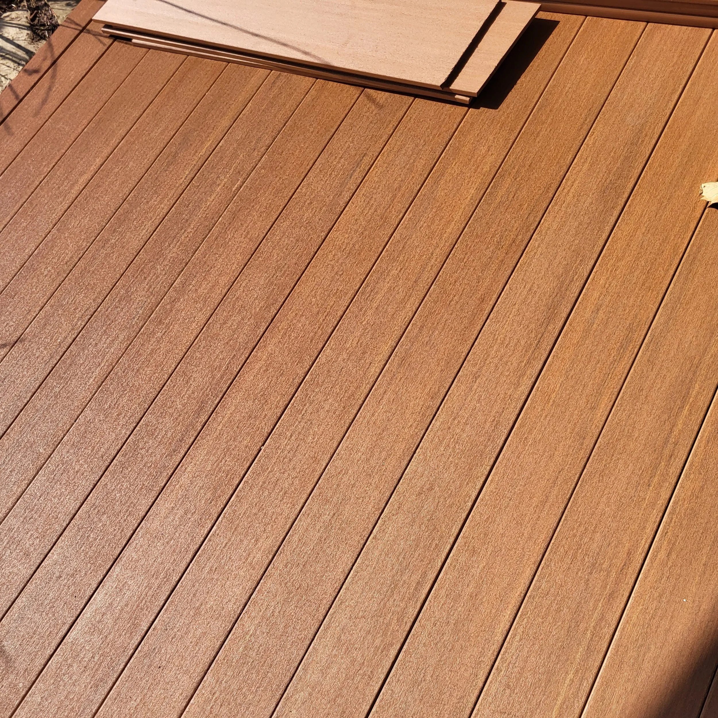 Composite Decking Board Placement Close-Up for Proper Alignment