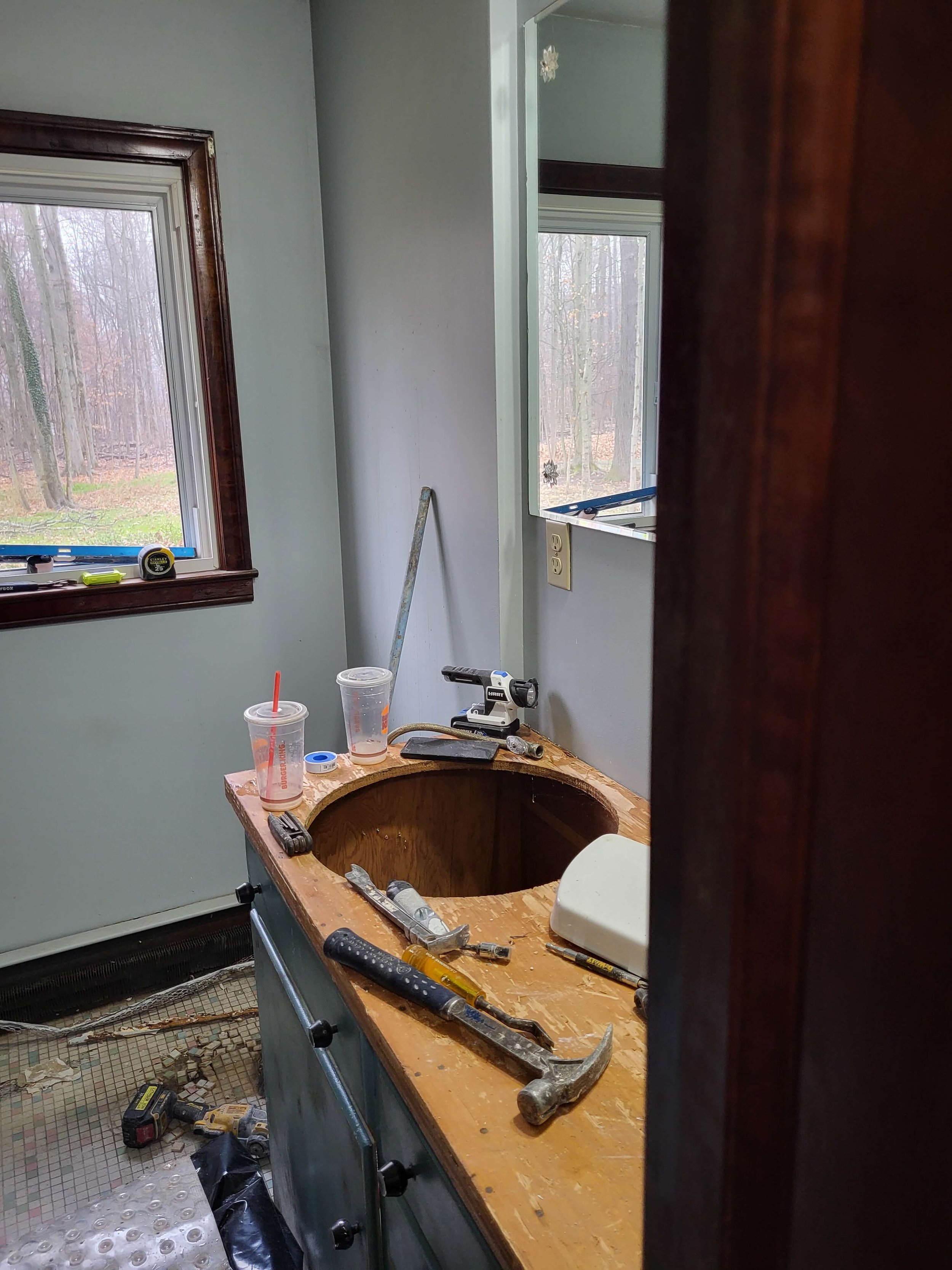 Before Photo of Small Outdated Bathroom Layout