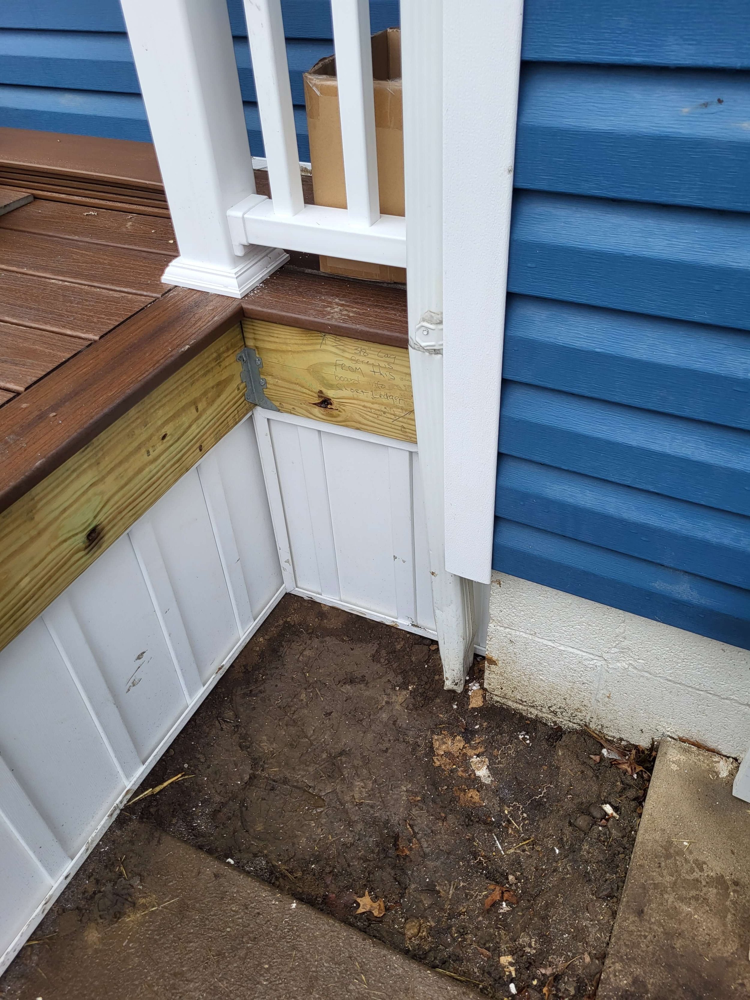front deck skirting with wood and white trim detail on composite deck in Akron Ohio