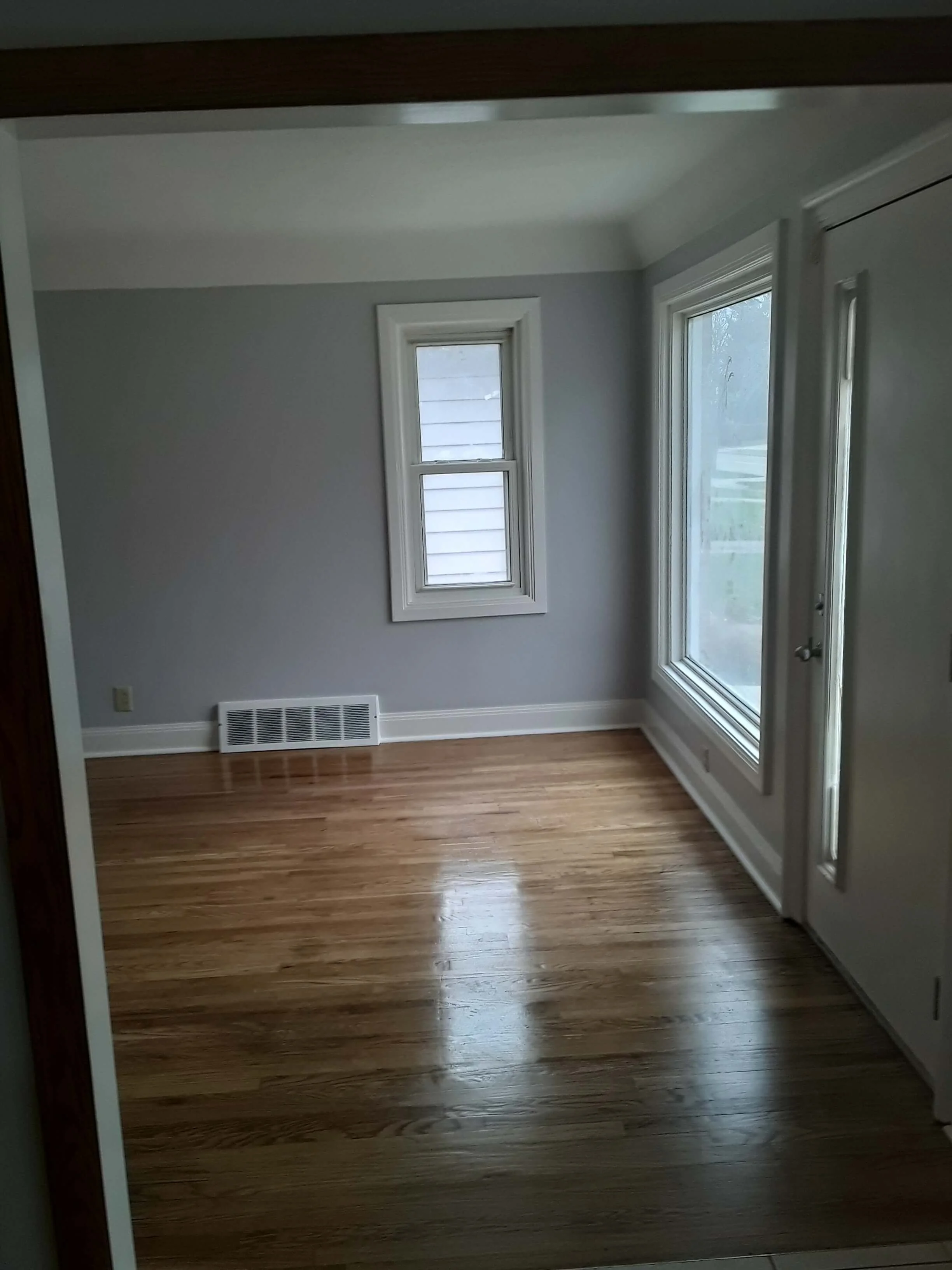 DLR Construction hardwood floor sanding and refinishing project with wallpaper removal and wall restoration in Cleveland Ohio