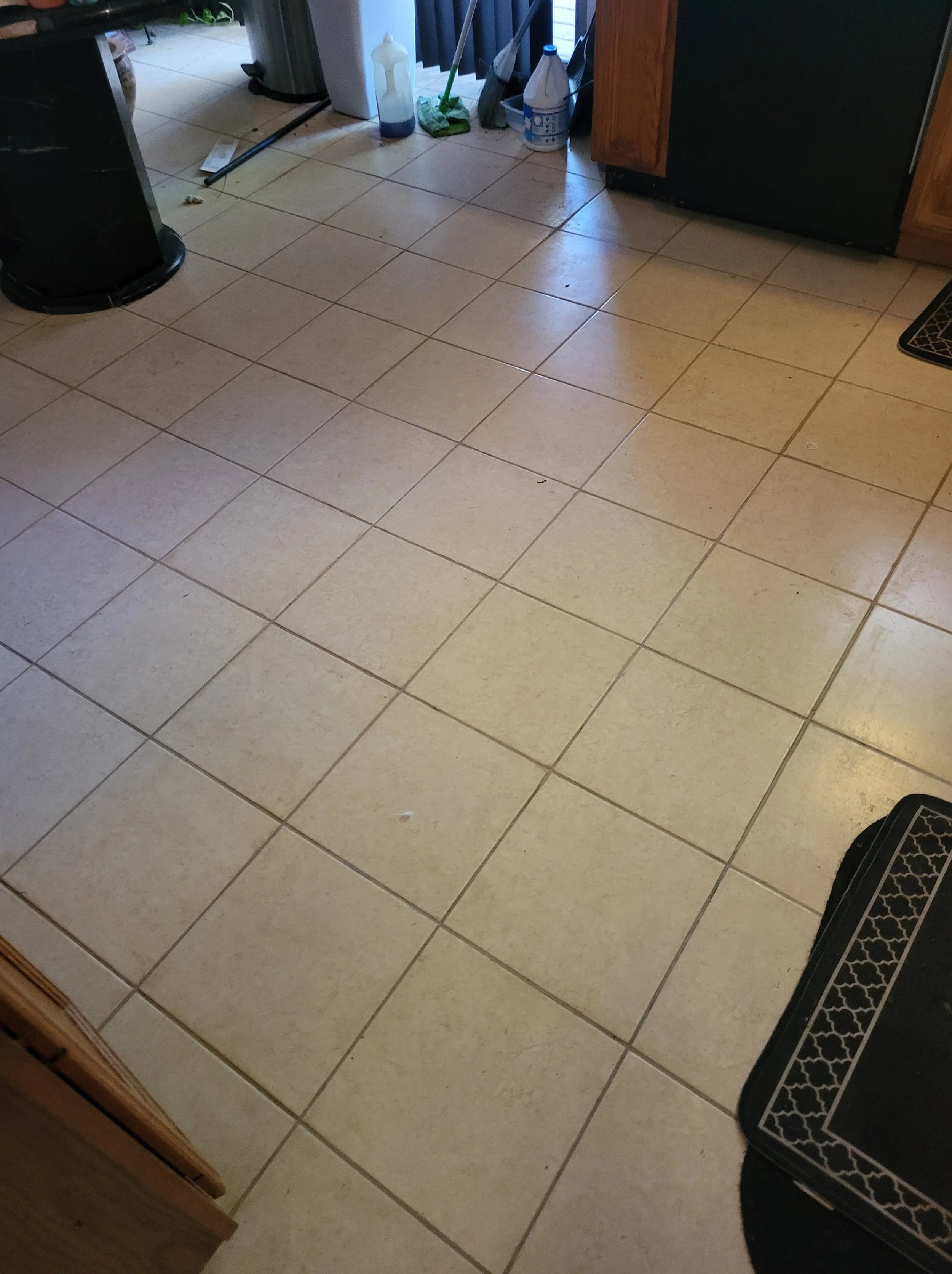 Tile Flooring regrouted and sealed 3 times by DLR Construction.