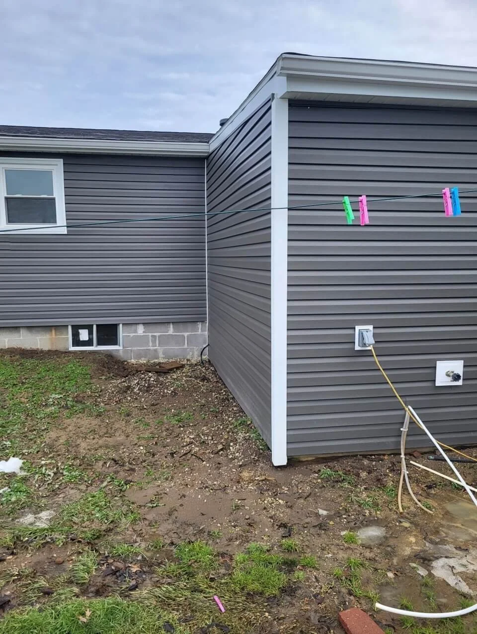 Close-up of siding corner detail showing clean lines and precise installation