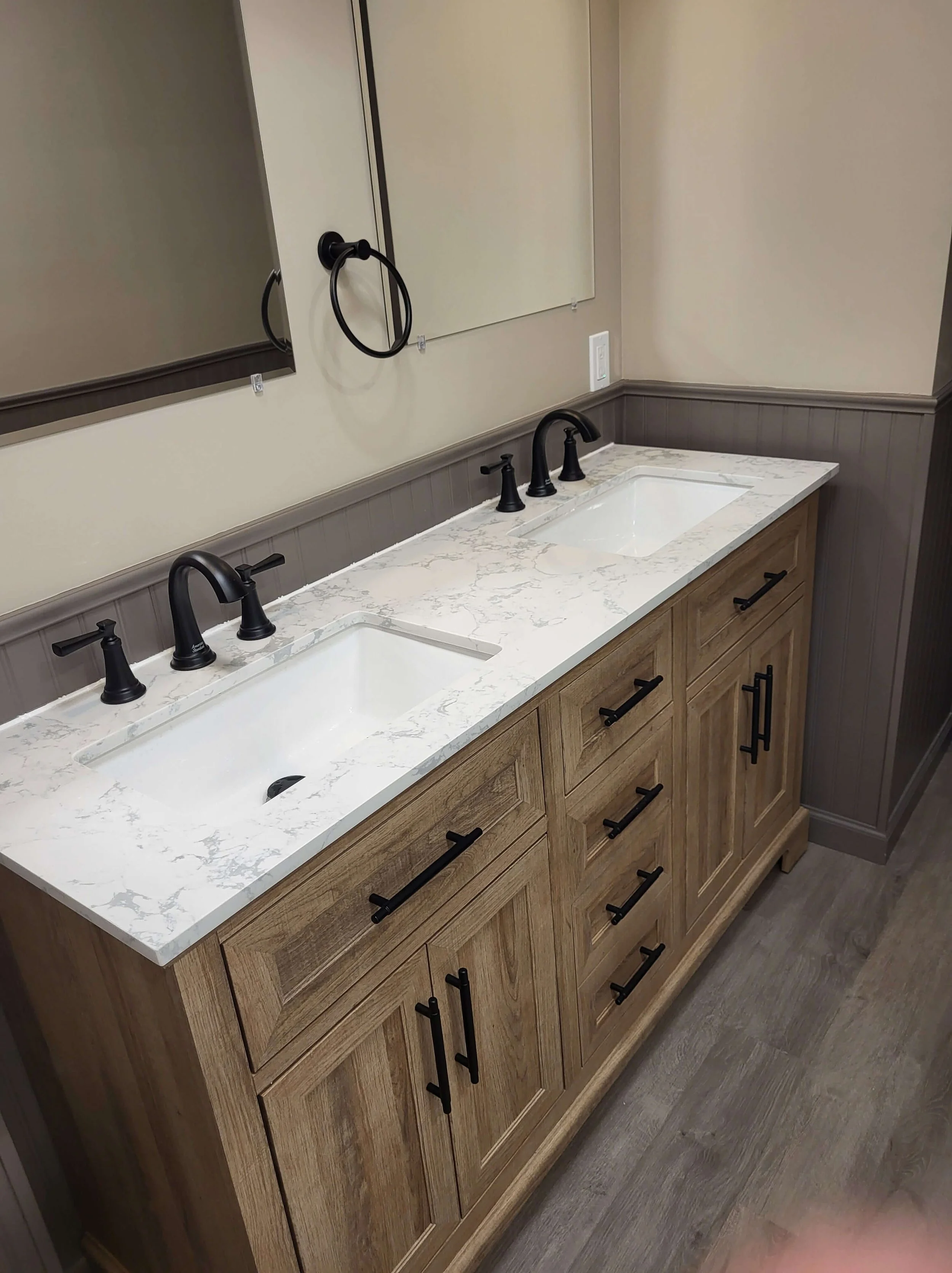 Soft-close vanity storage in finished Northeast Ohio bathroom renovation