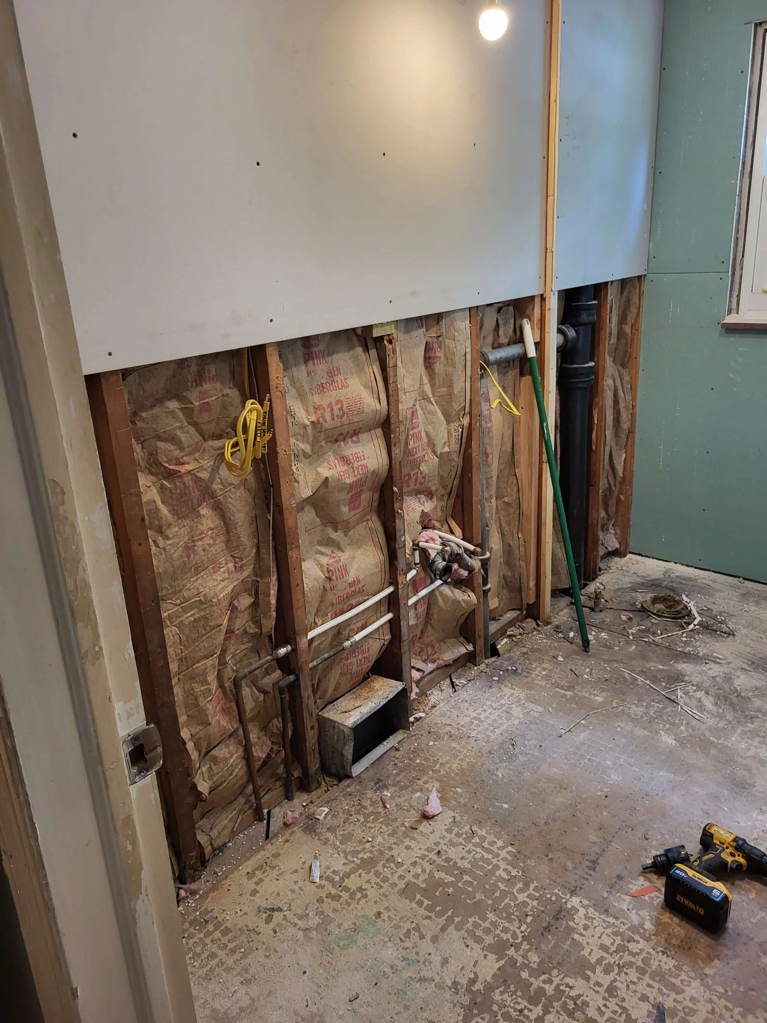 DLR Construction replacing old water lines and updating rough-in plumbing during a full bathroom remodel in Stow Ohio.