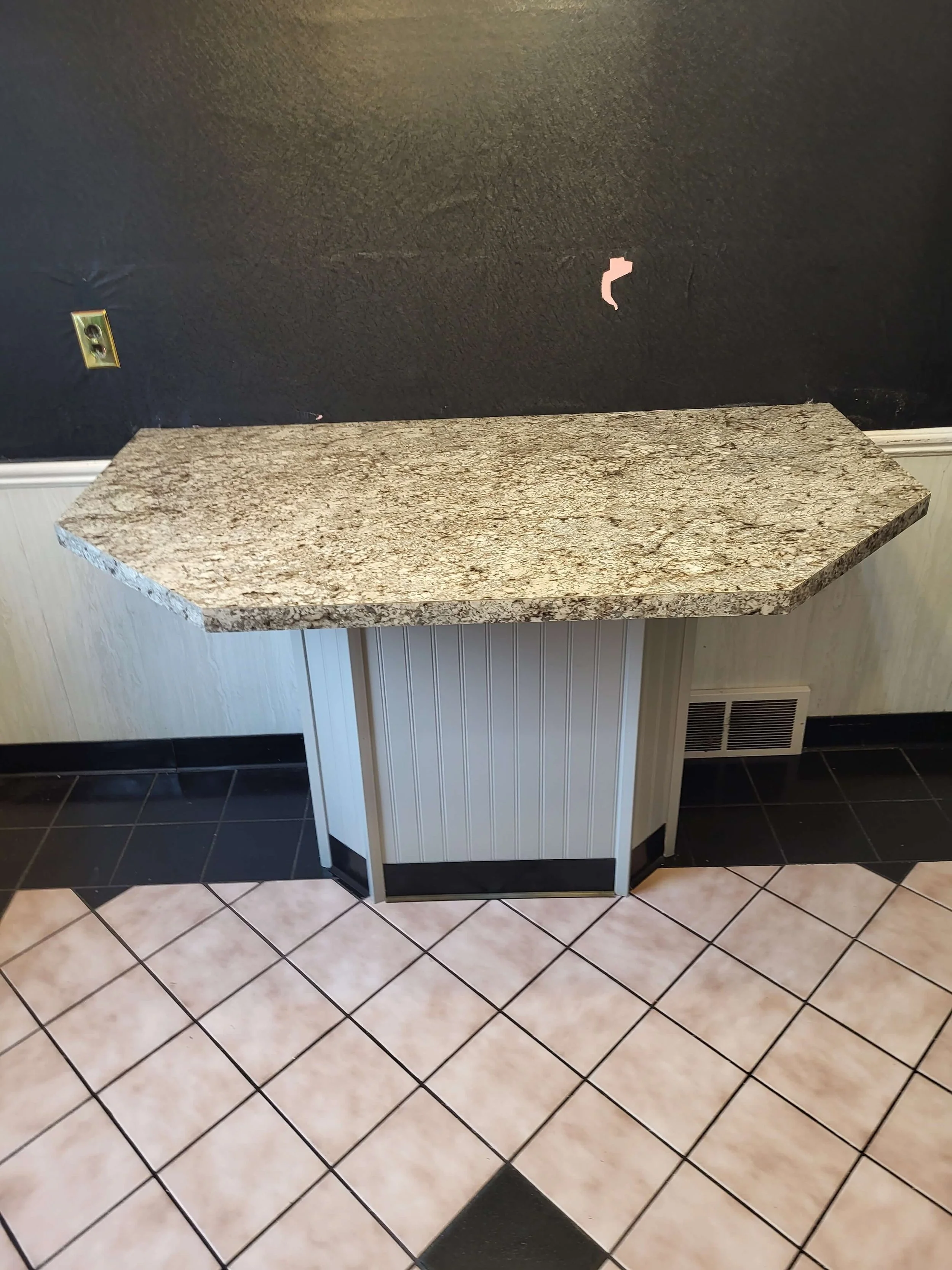 Custom beadboard kitchen island with premium granite countertops by DLR Construction in Tallmadge Ohio.