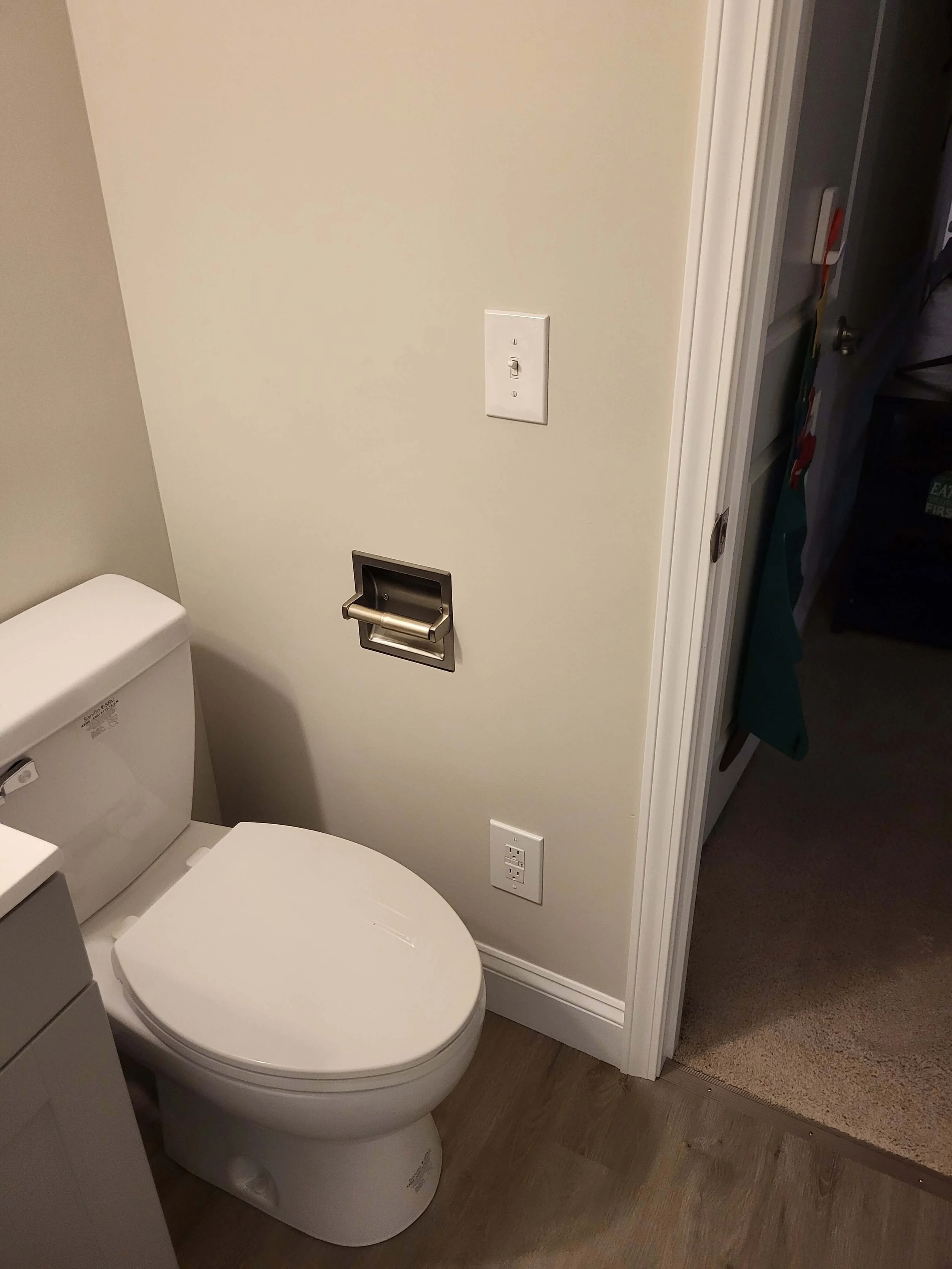 Up-flush toilet installation in finished basement bathroom