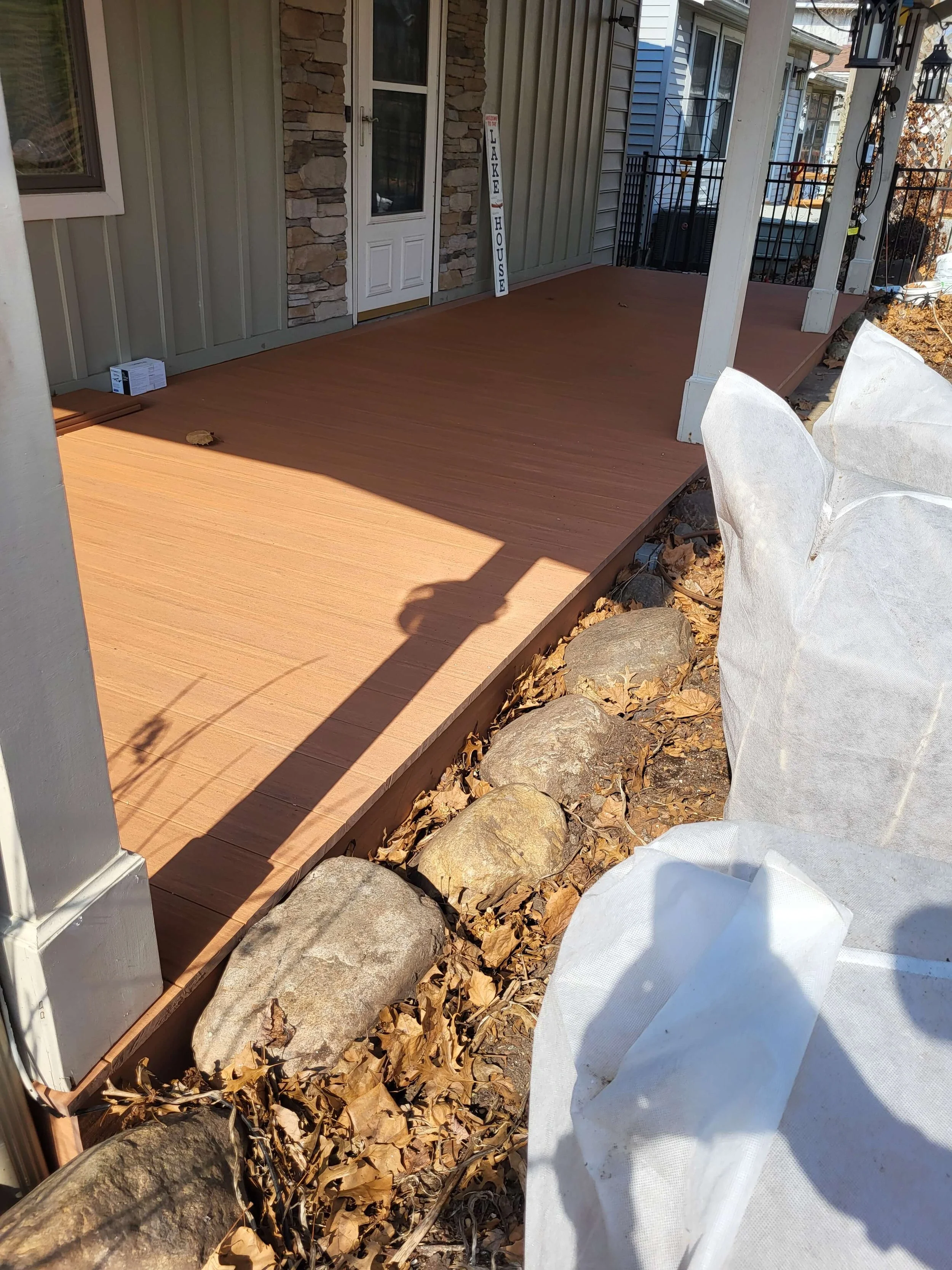 Modern composite deck replacement with clean edge perimeter boards by DLR Construction in Stow Ohio.