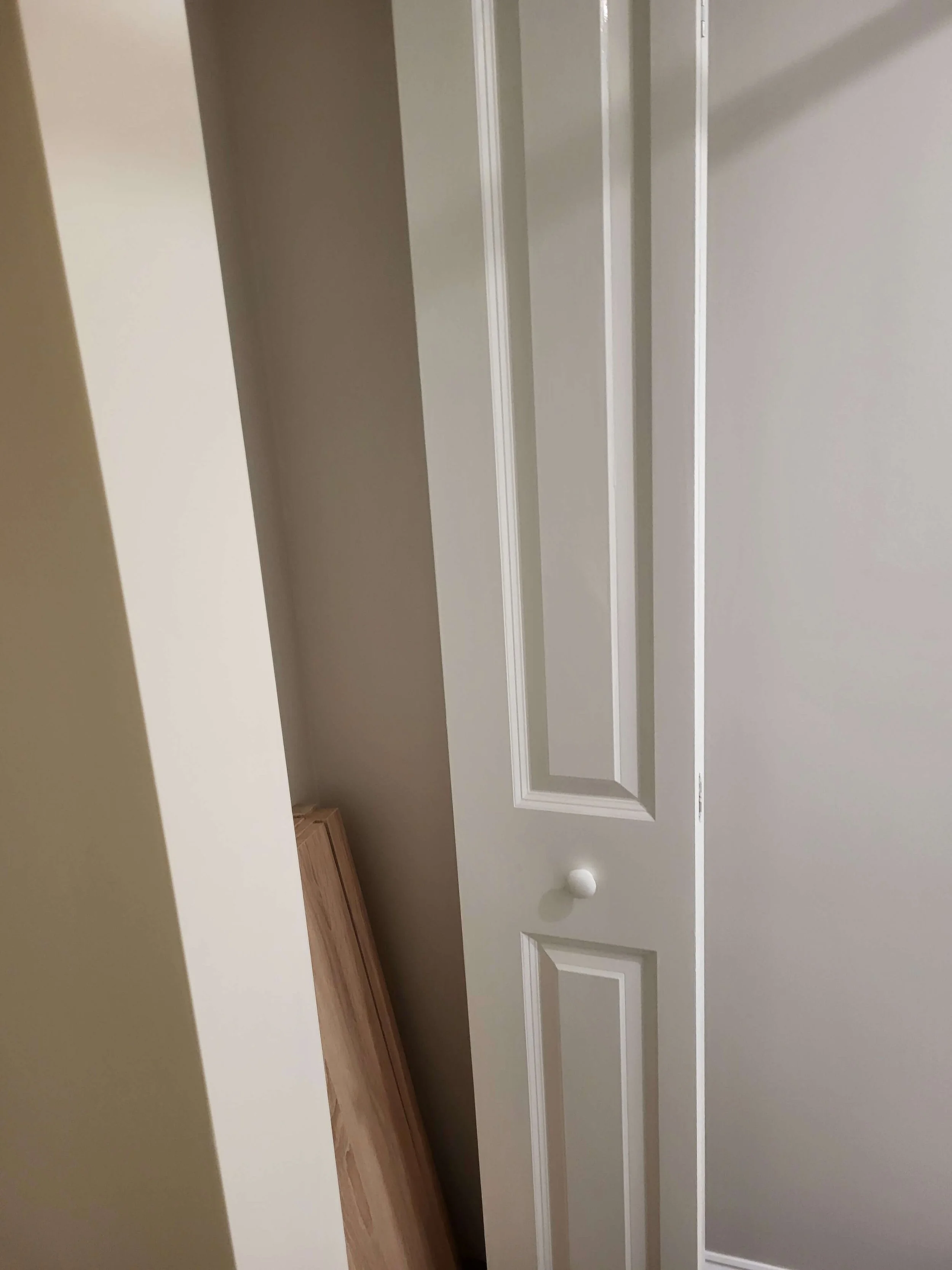 Access door to linen closet room in basement