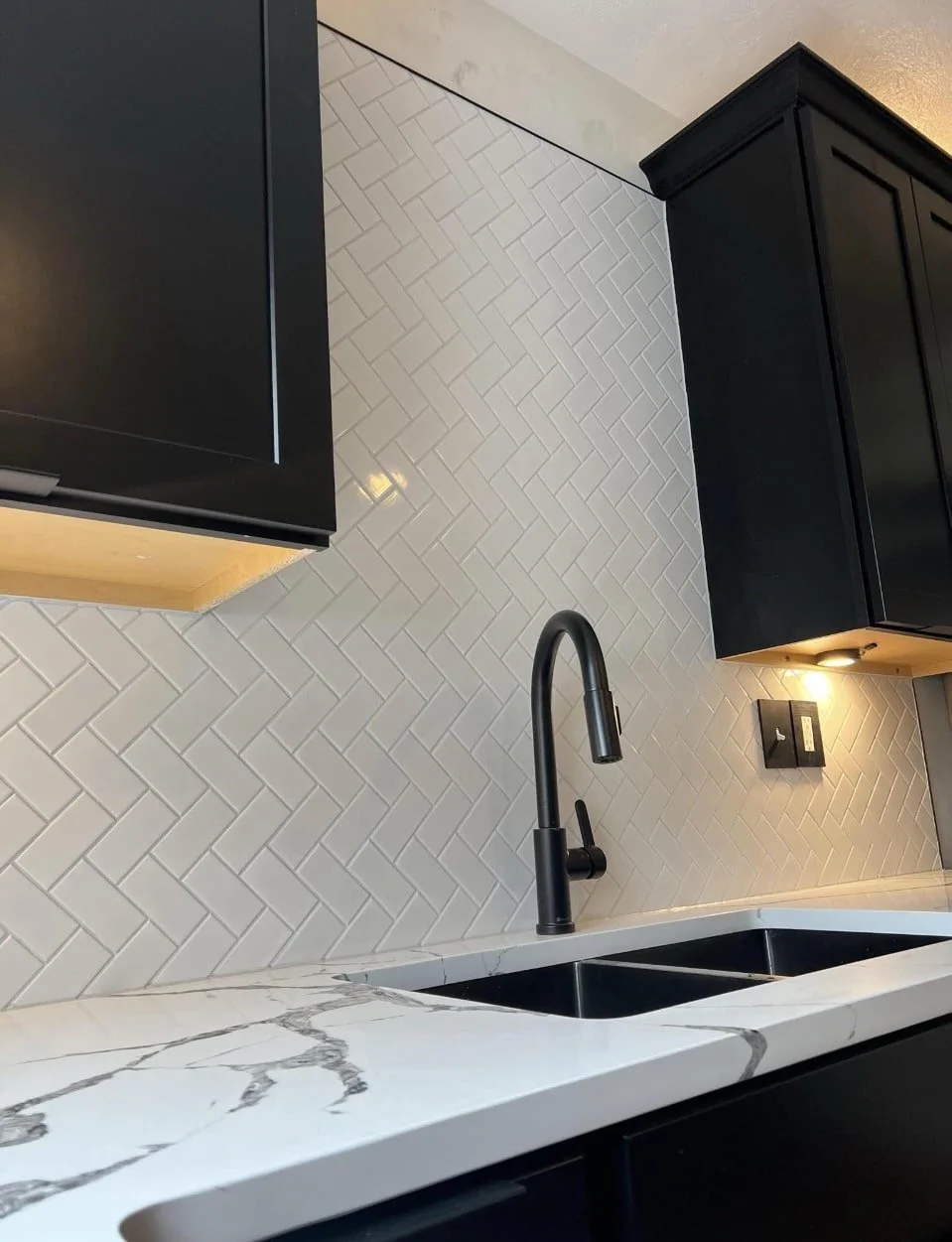 Backsplash Herring-bone patterned, Cabinetry Lighting, Electrical, Matching Accessories, Matching Switch covers.