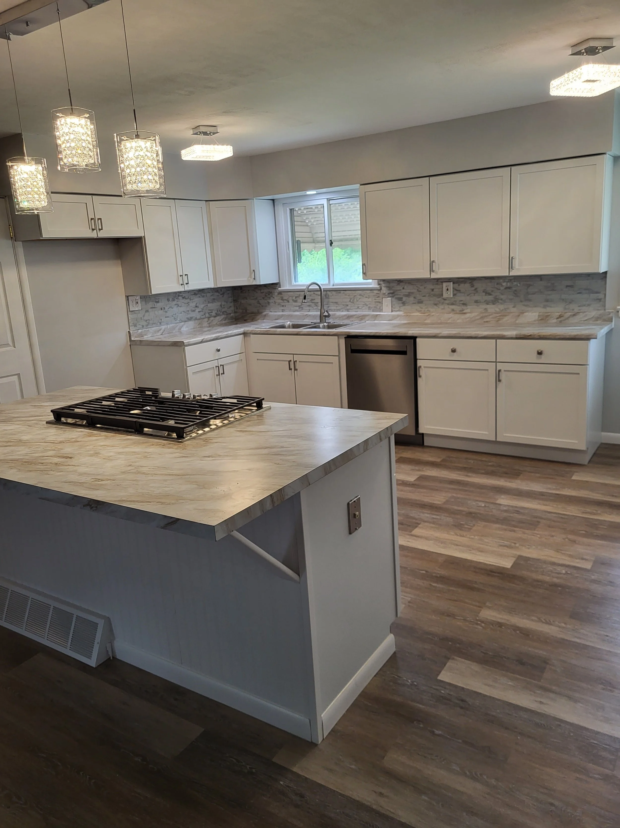 Custom-built (MDF) Island with Laminate Countertops. Electrical boxes installed, more Flooring, Electrical accommodations. 
