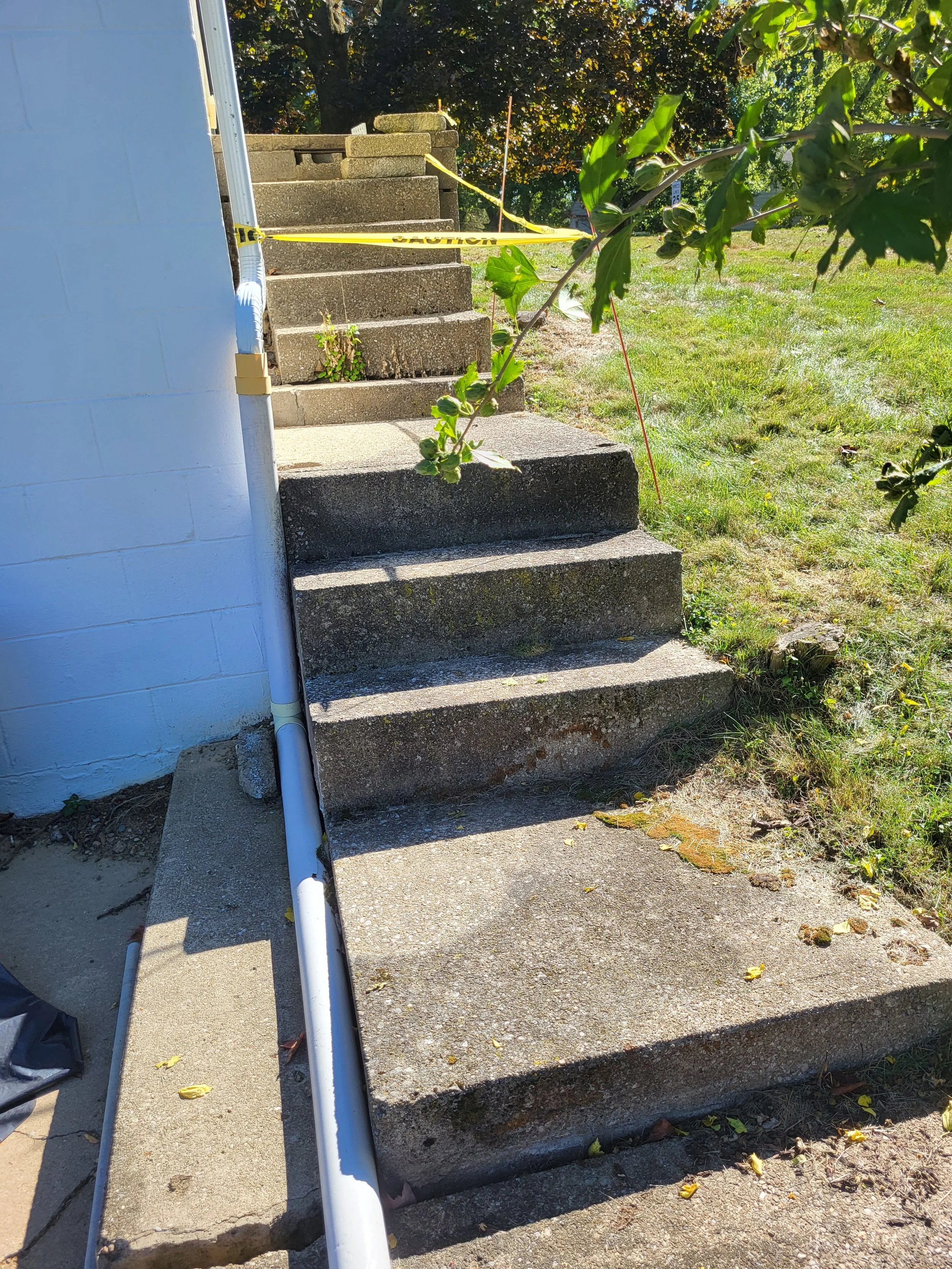 Before Renovations, Failing stairs to the garage area of NE, OH home with Unsafe Conditions