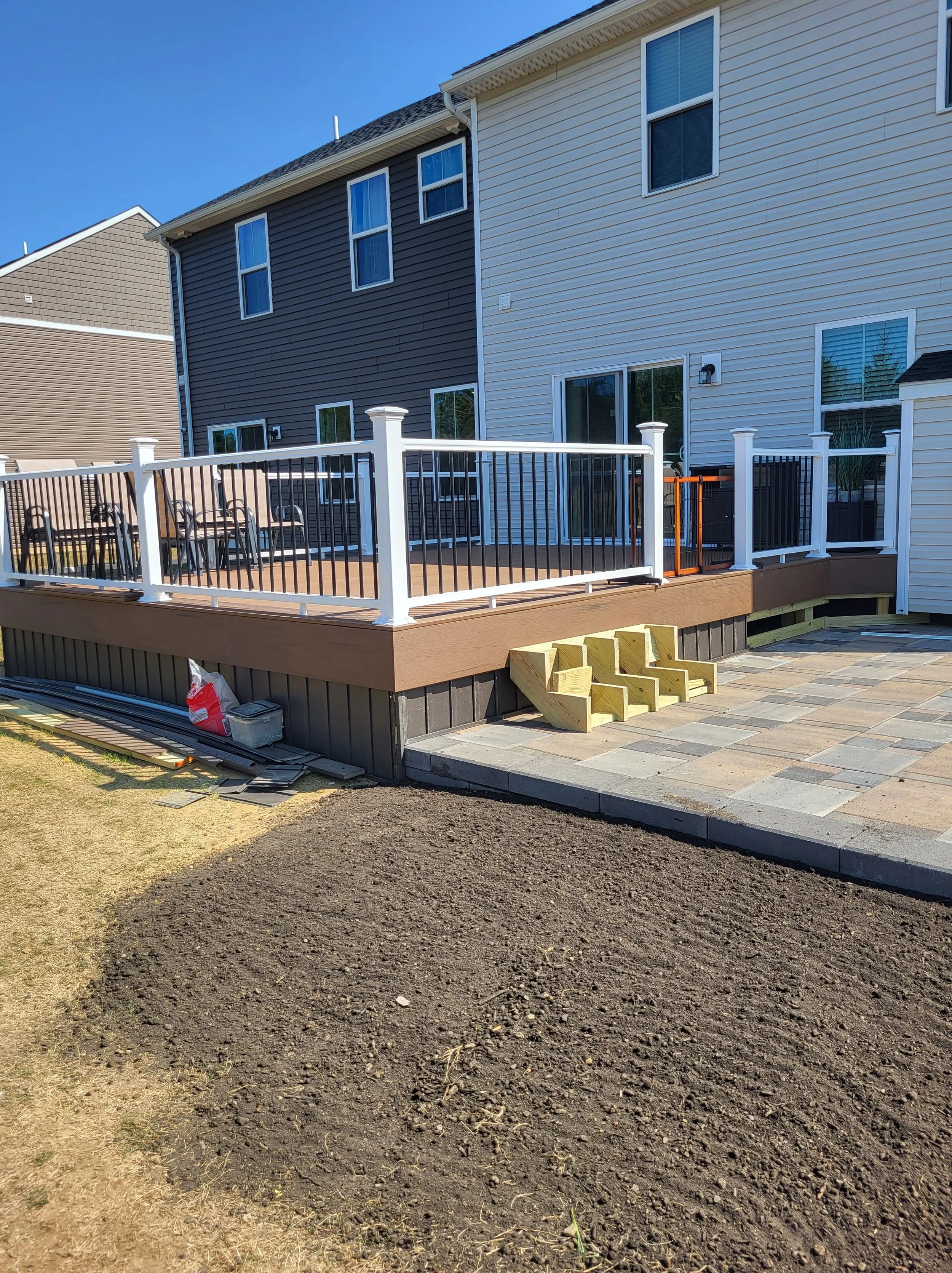Finished Handrail/ Patio Installation / Decking Steps During Photo 