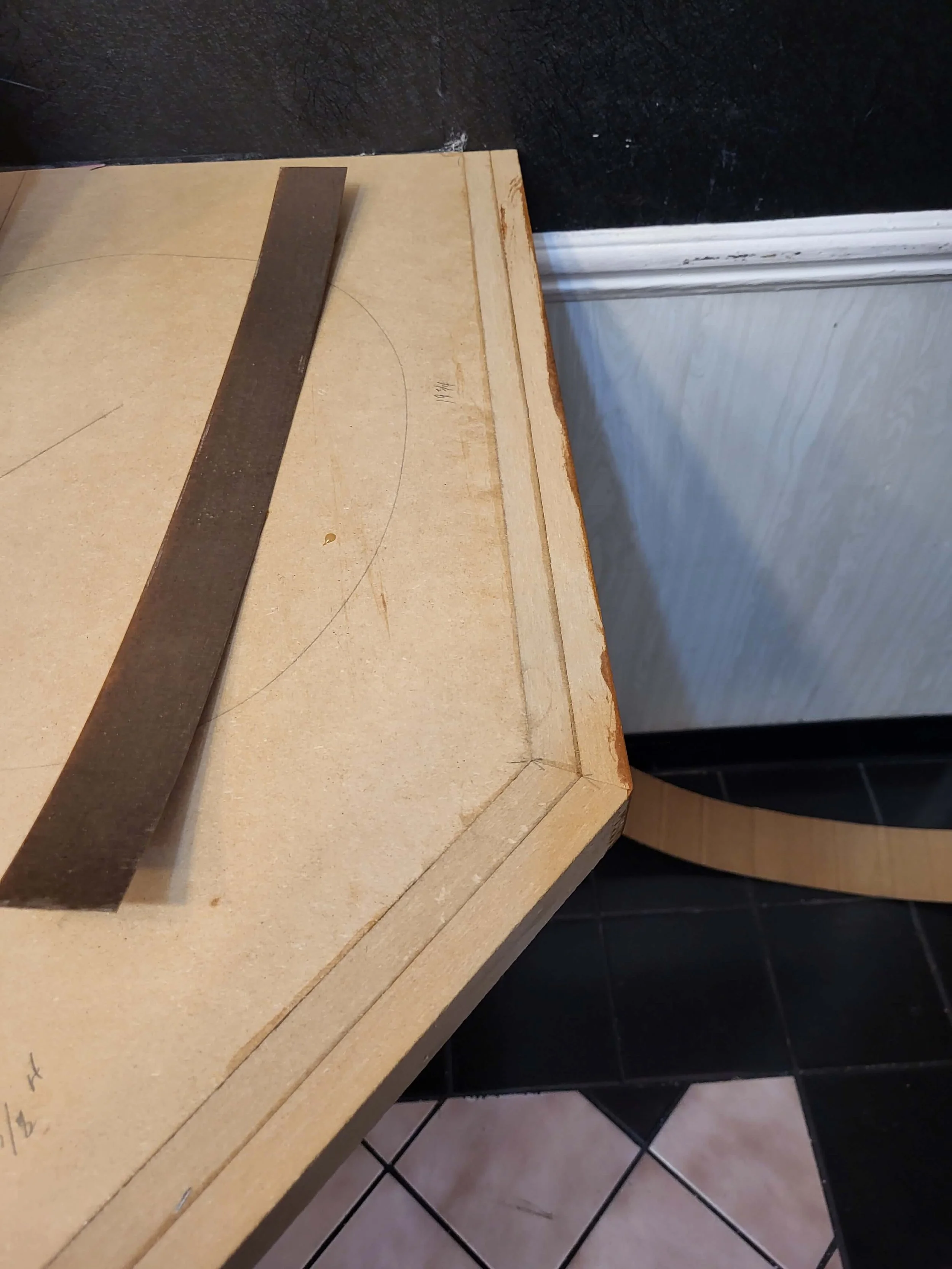 nitial MDF substrate boards arranged for layout and preparation during a custom countertop build