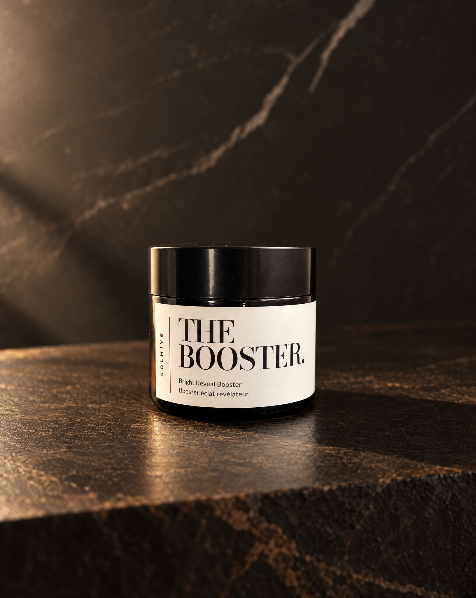 The booster on dark stone.png