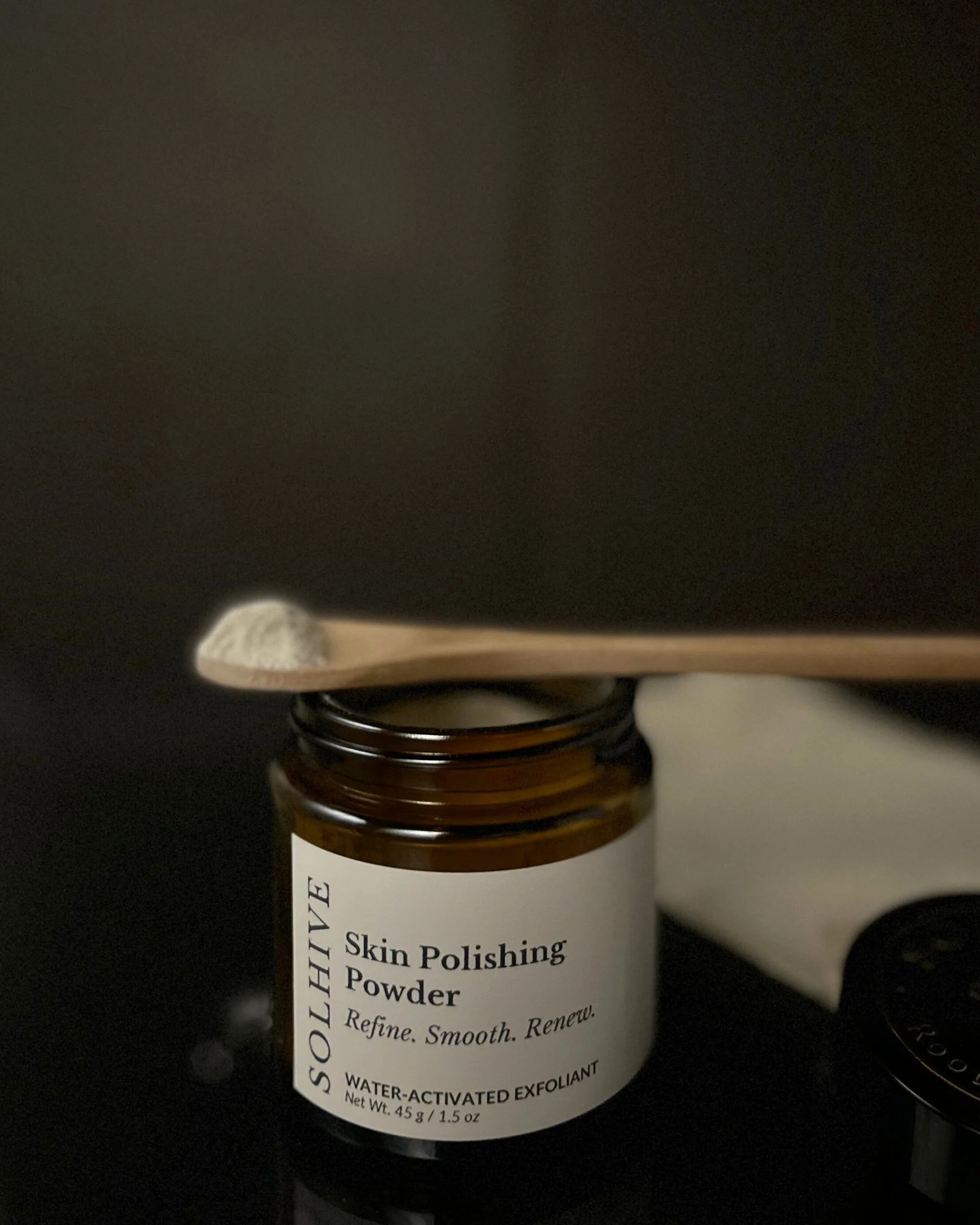 Skin Polishing Powder Spoon Open.jpg