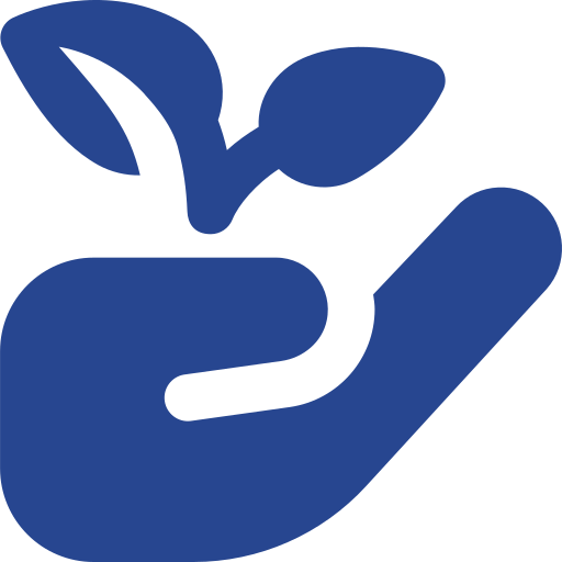 Silhouette of a hand holding a small plant with two leaves.