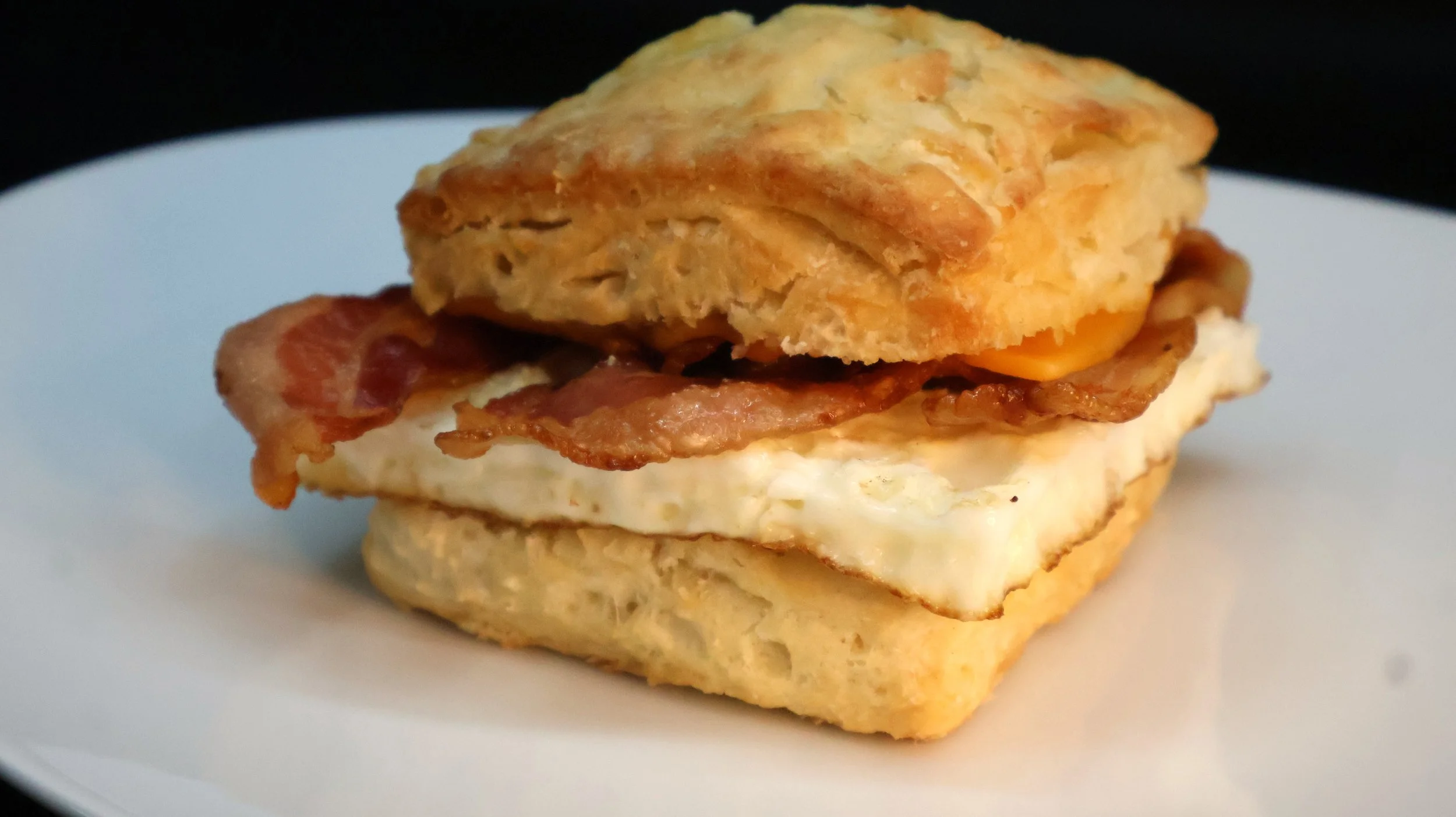 Biscuits, bacon, and egg sandwhich