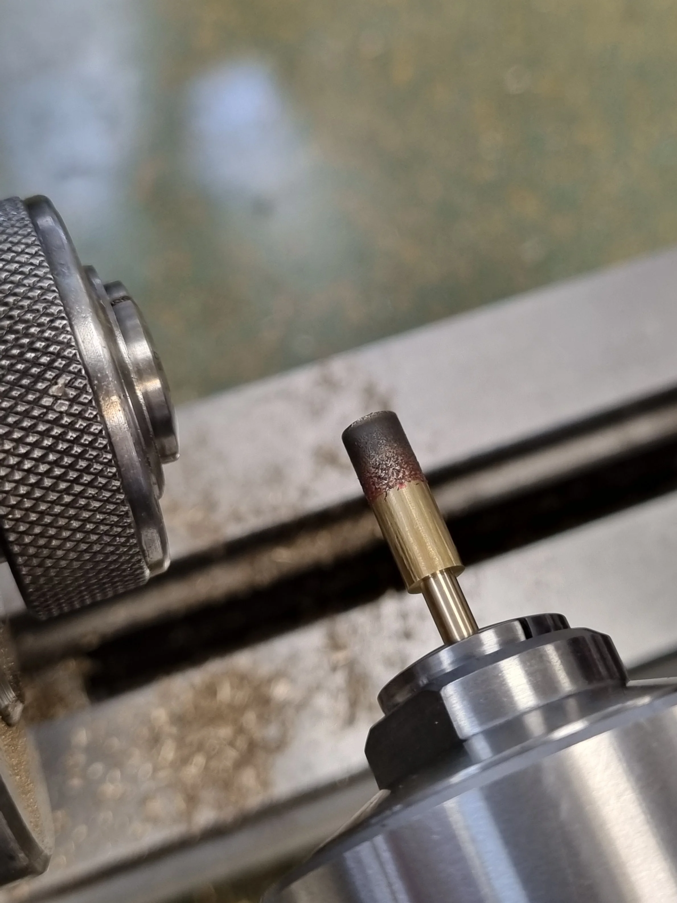 Setup for ratchet wheel finishing