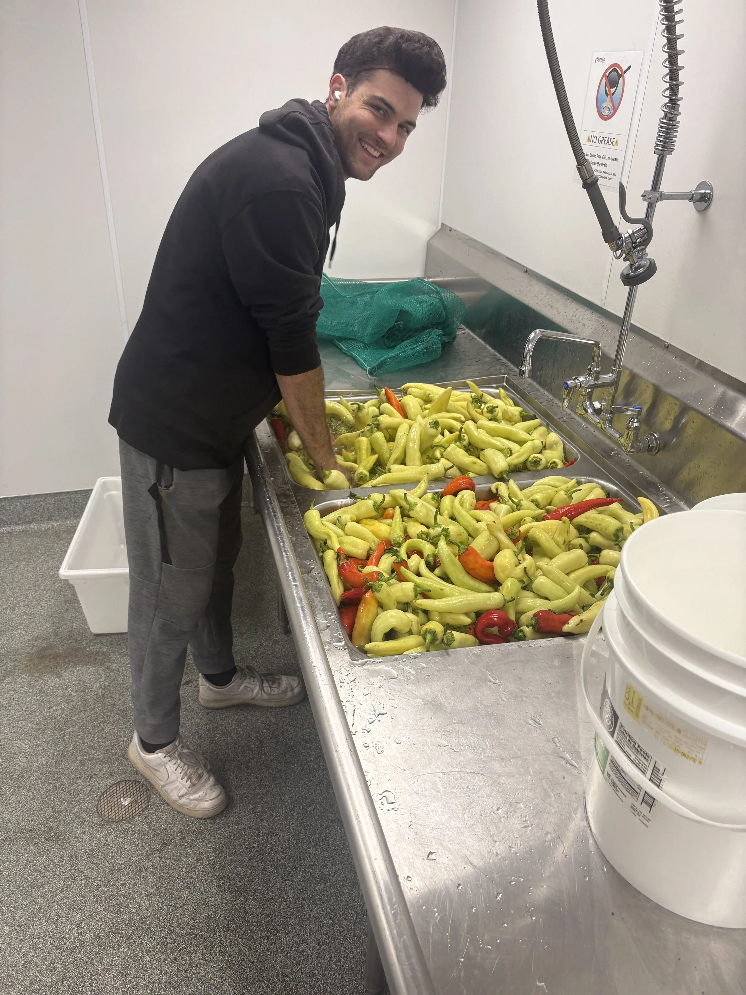 Get Zingy_Sam Washing Peppers.jpg