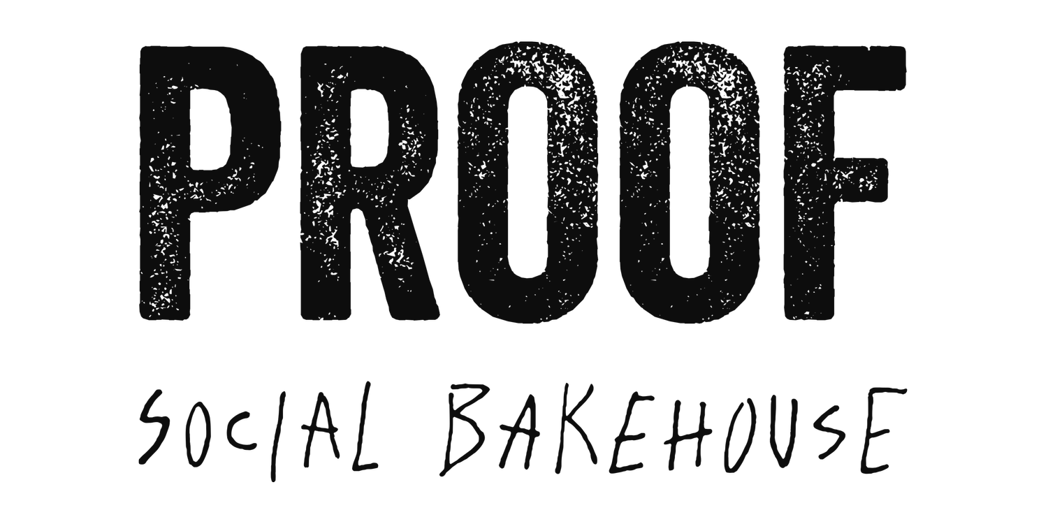 Logo for Proof Social Bakehouse with the word "PROOF" in large black letters and "SOCIAL BAKEHOUSE" in smaller handwritten style underneath.