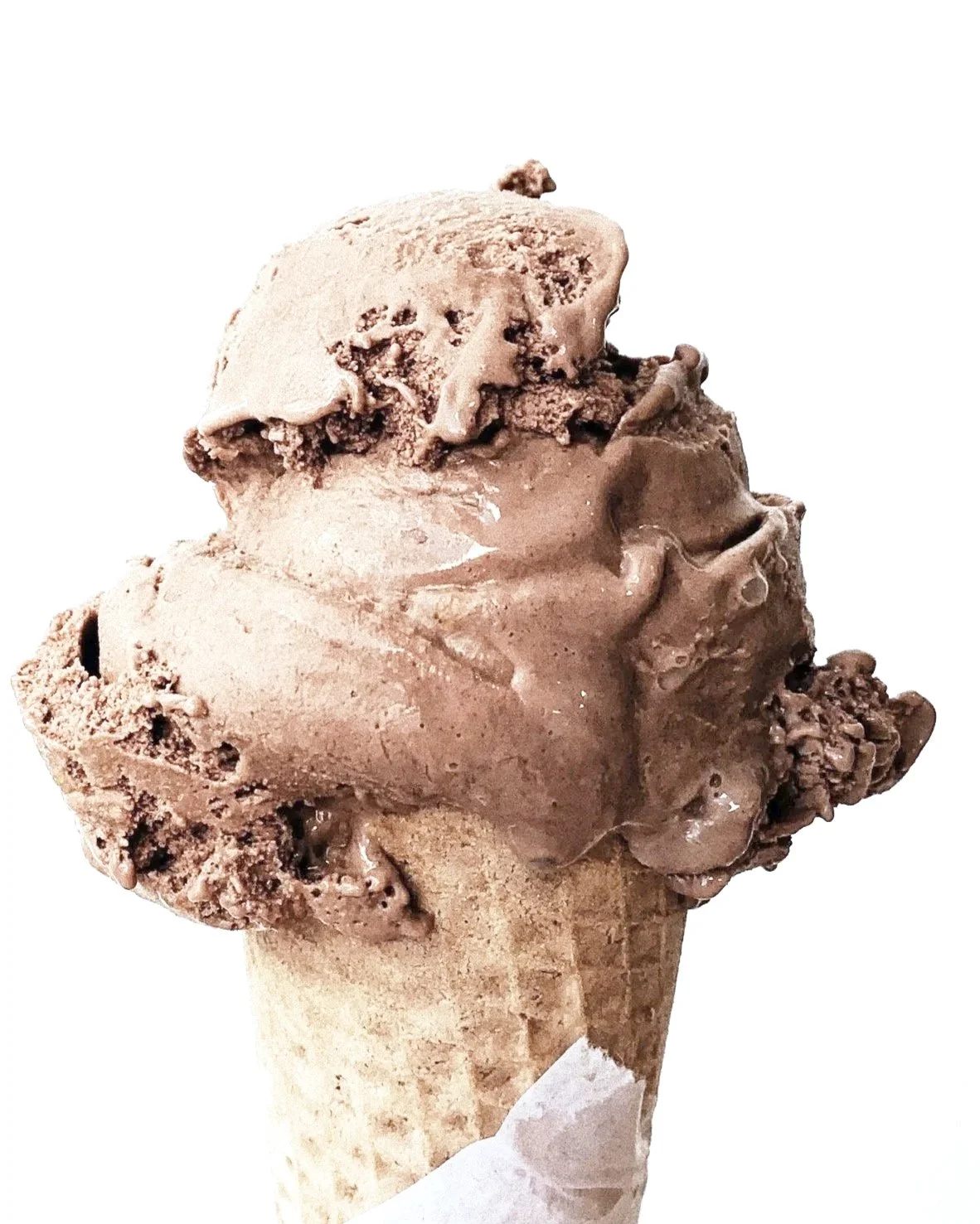 Close-up of a scoop of chocolate ice cream on a cone with chocolate chunks, against a plain white background.