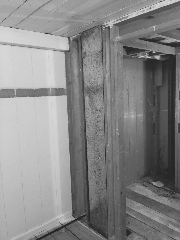 Bathroom renovation in progress with visible wood framing by At Design Remodel in Mashpee.jpg
