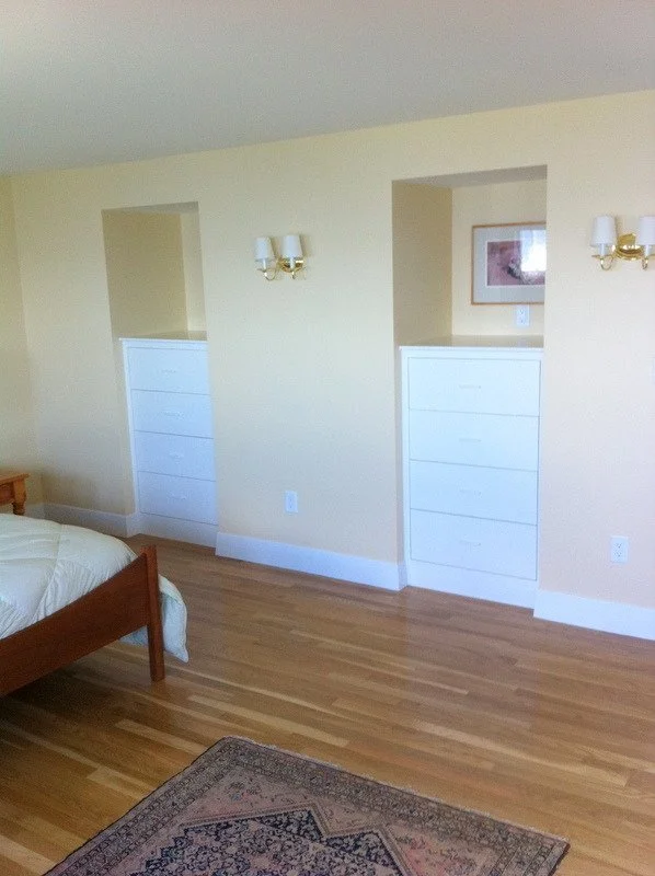 Custom built-in bedroom storage units in a Cataumet home remodel by At Design Remodel.jpg