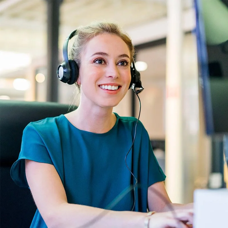 A young woman with blonde hair healthcare billing specialist assisting mental health providers with Forward Revenue Management