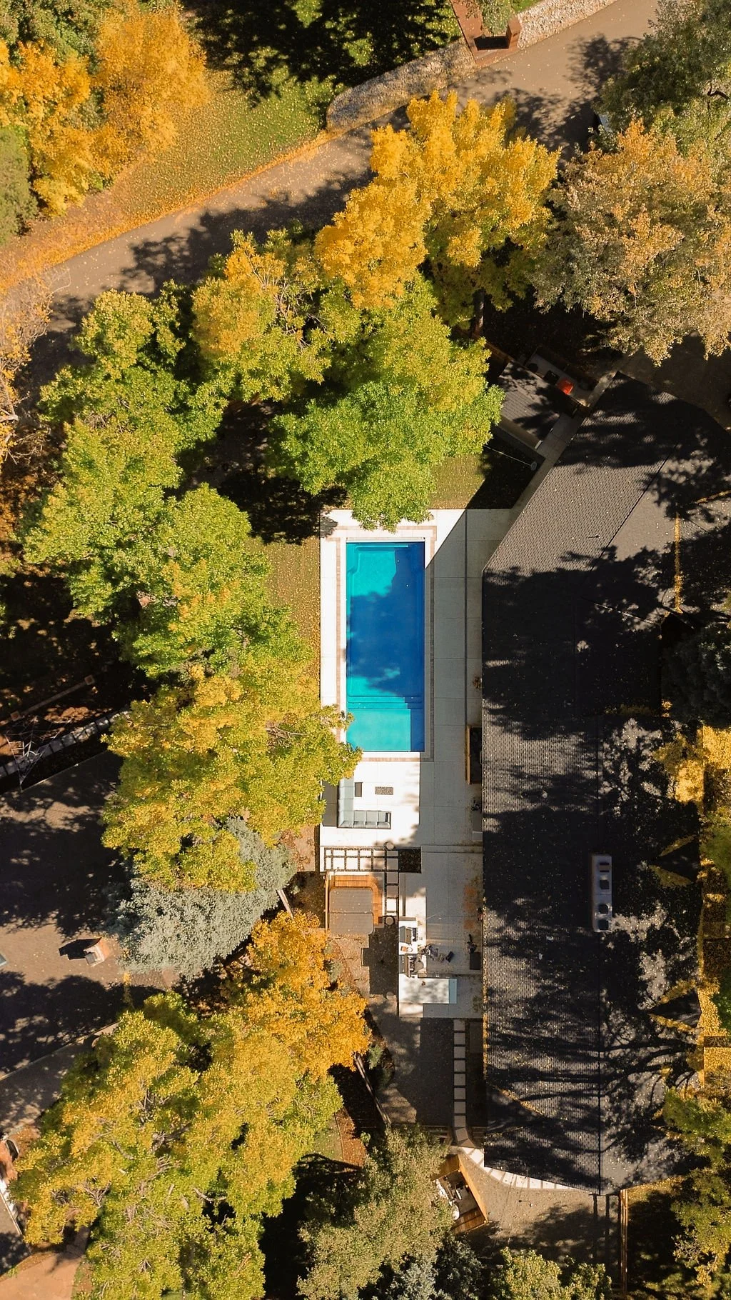 Drone photo of deep blue fiberglass swimming pool