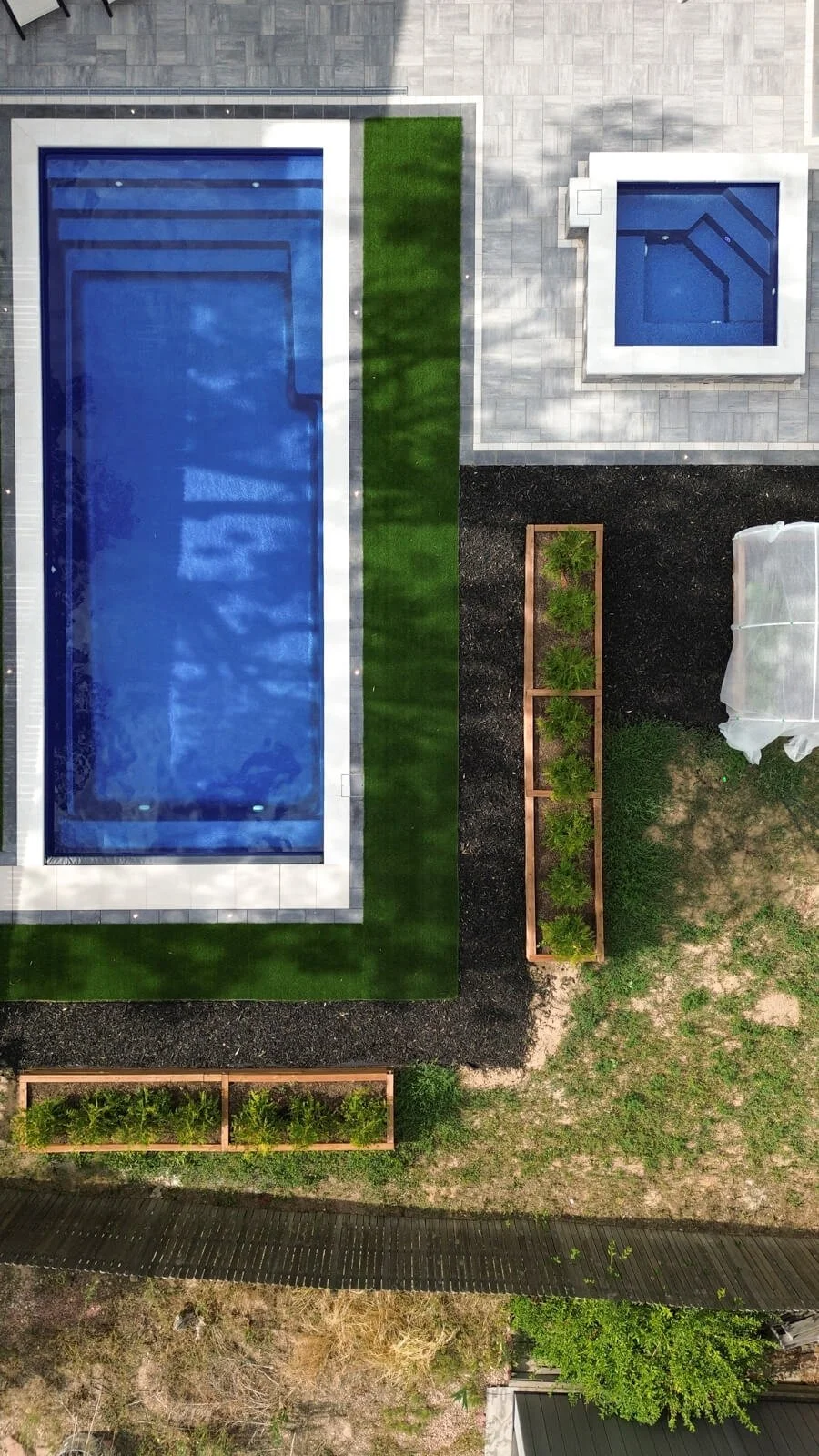 Shot from above fiberglass pool and spa