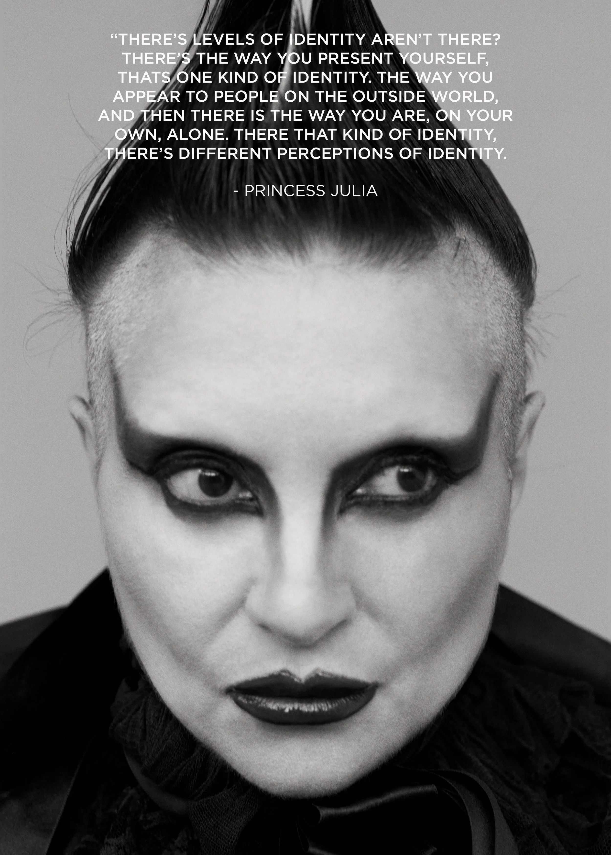 Black and white portrait of a woman with dramatic makeup, styled hair in a high pompadour, and wearing dark clothing. Overlaid is a quote by Princess Julia discussing levels of identity and perception.