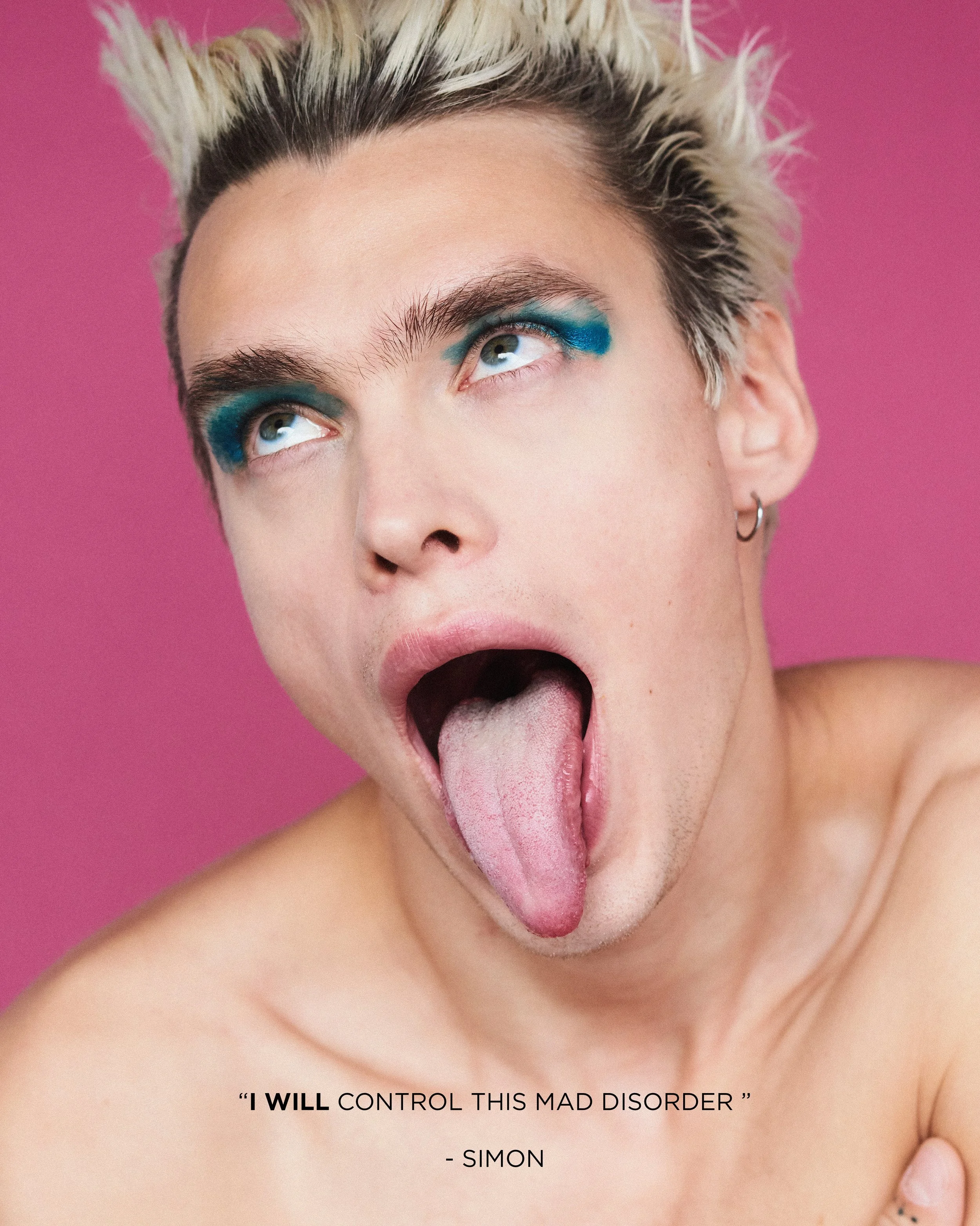A young man with short, spiked blond hair and turquoise eye makeup sticking out his tongue against a pink background. Text at the bottom reads "I will control this mad disorder" - Simon.