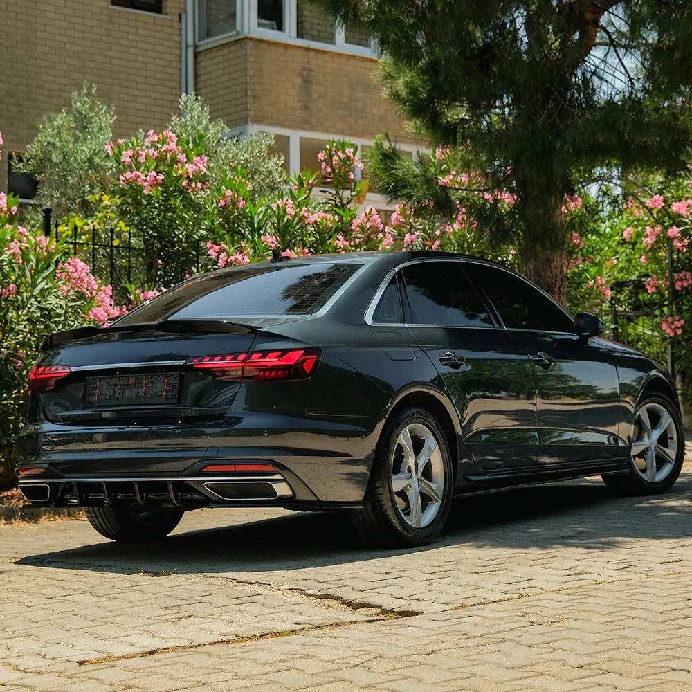 gloss-black-rear-spats-for-audi-a4-b9-2019-2024-2.webp