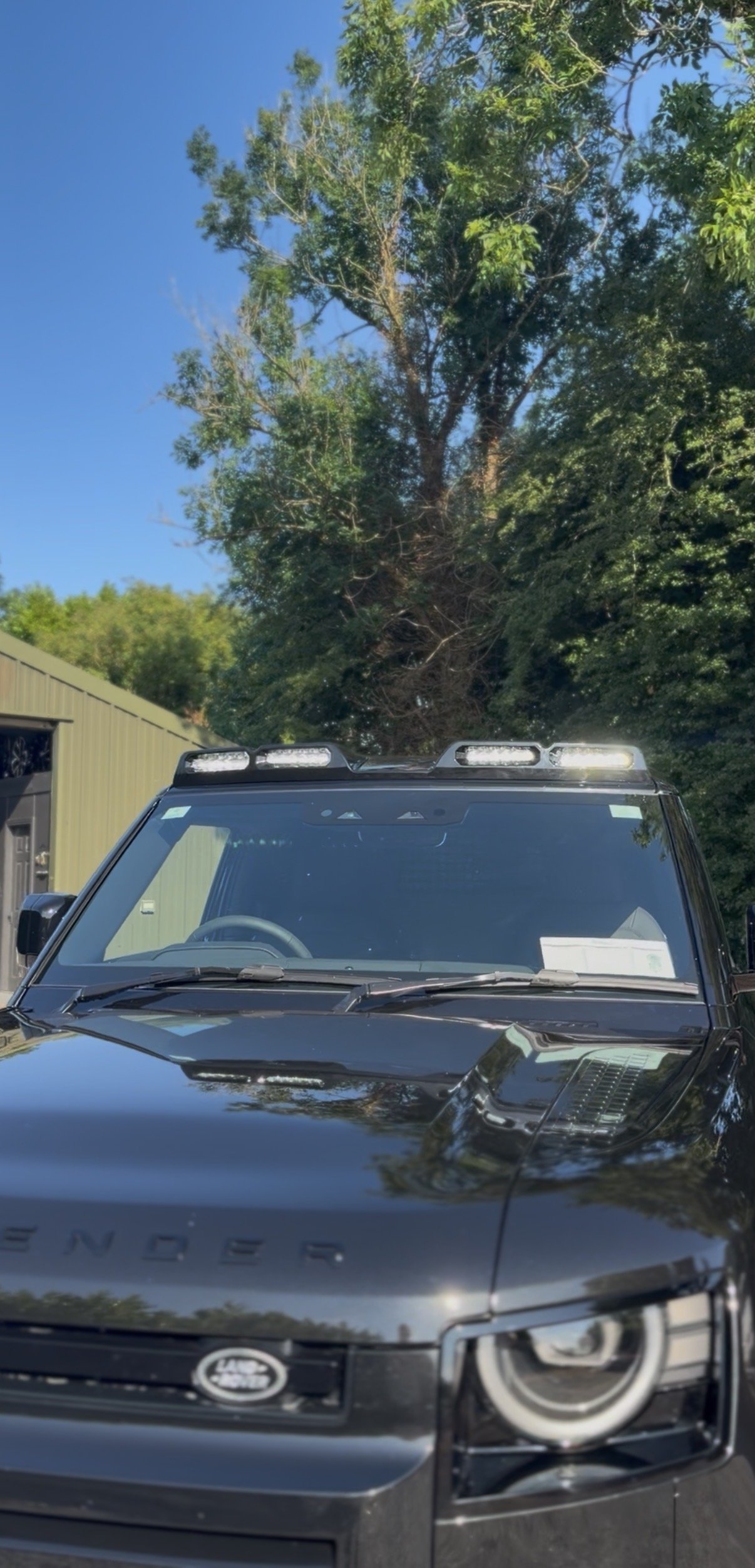 Land Rover Defender 90 roof light pod fitted in gloss black