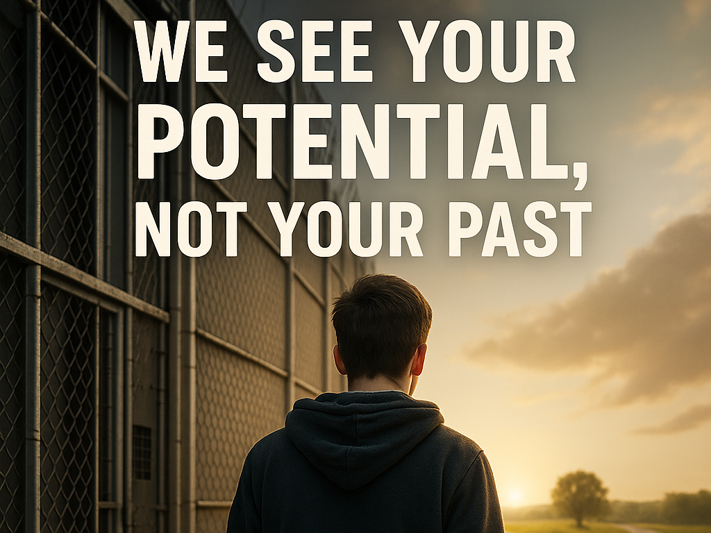 A person facing away from the camera toward an open road beside a fence, with the words ‘We see your potential, not your past’ displayed.
