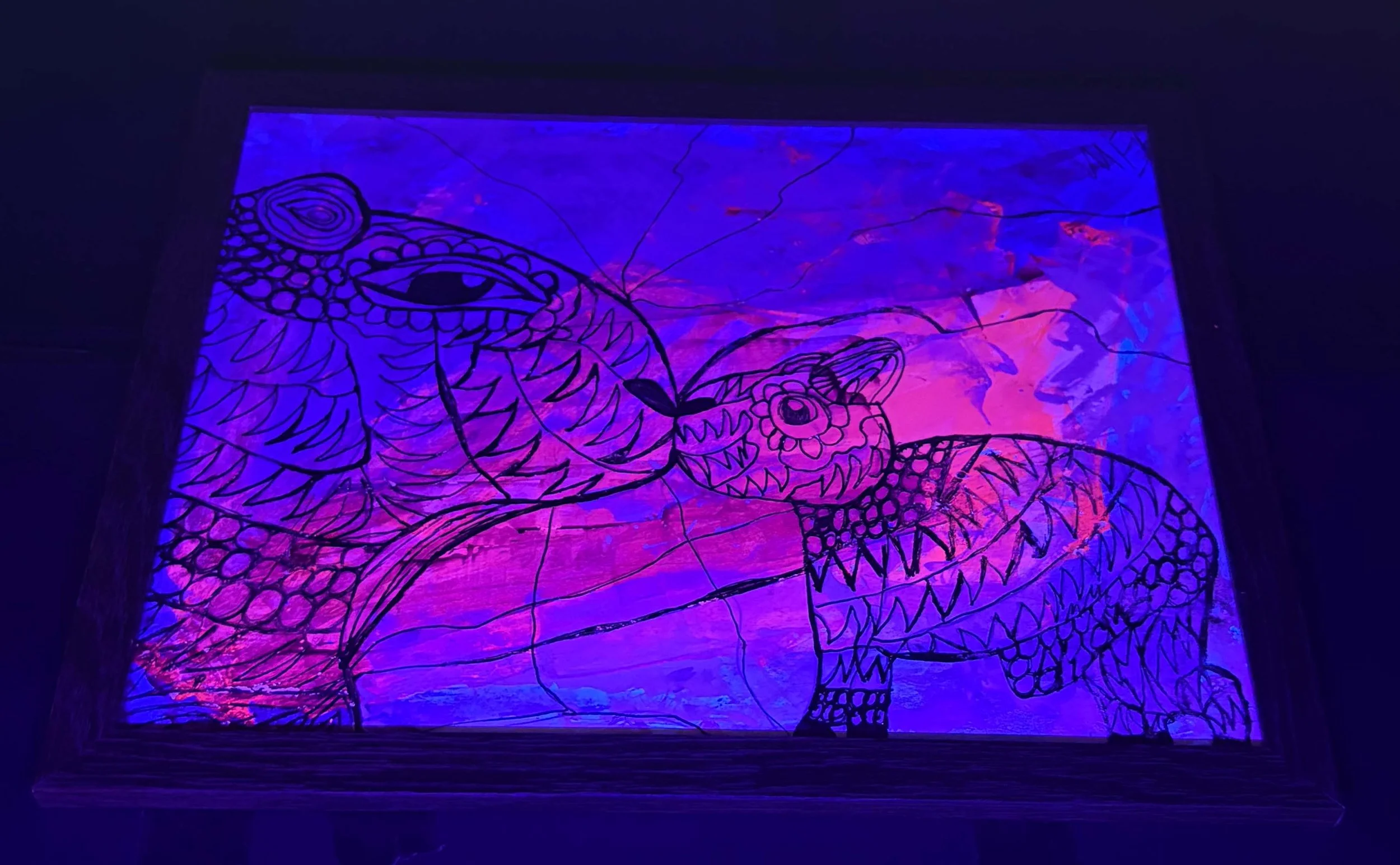 up cycled mamma and baby capybara black light .jpg