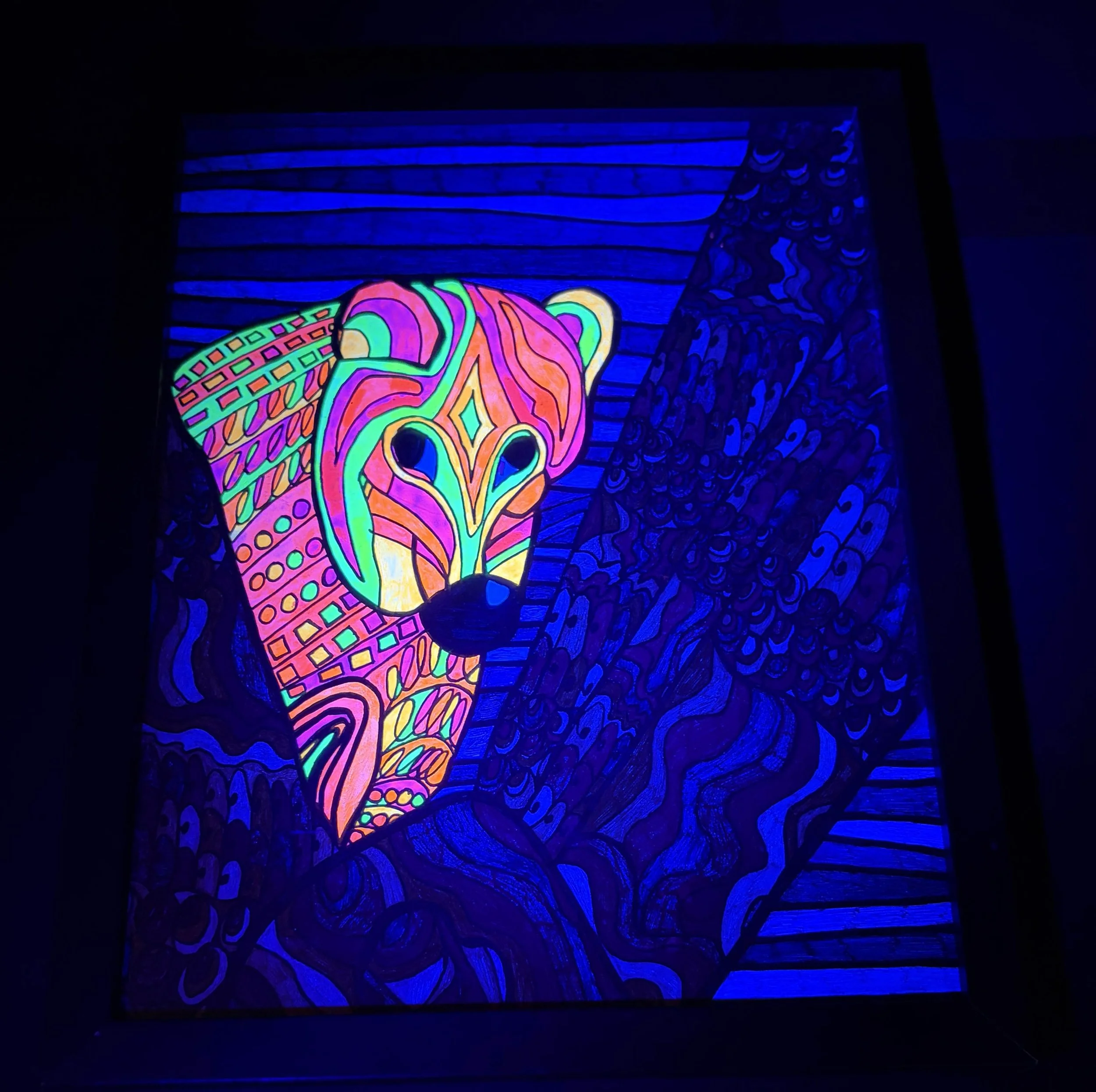 neon weasel in a tree blacklight.jpg